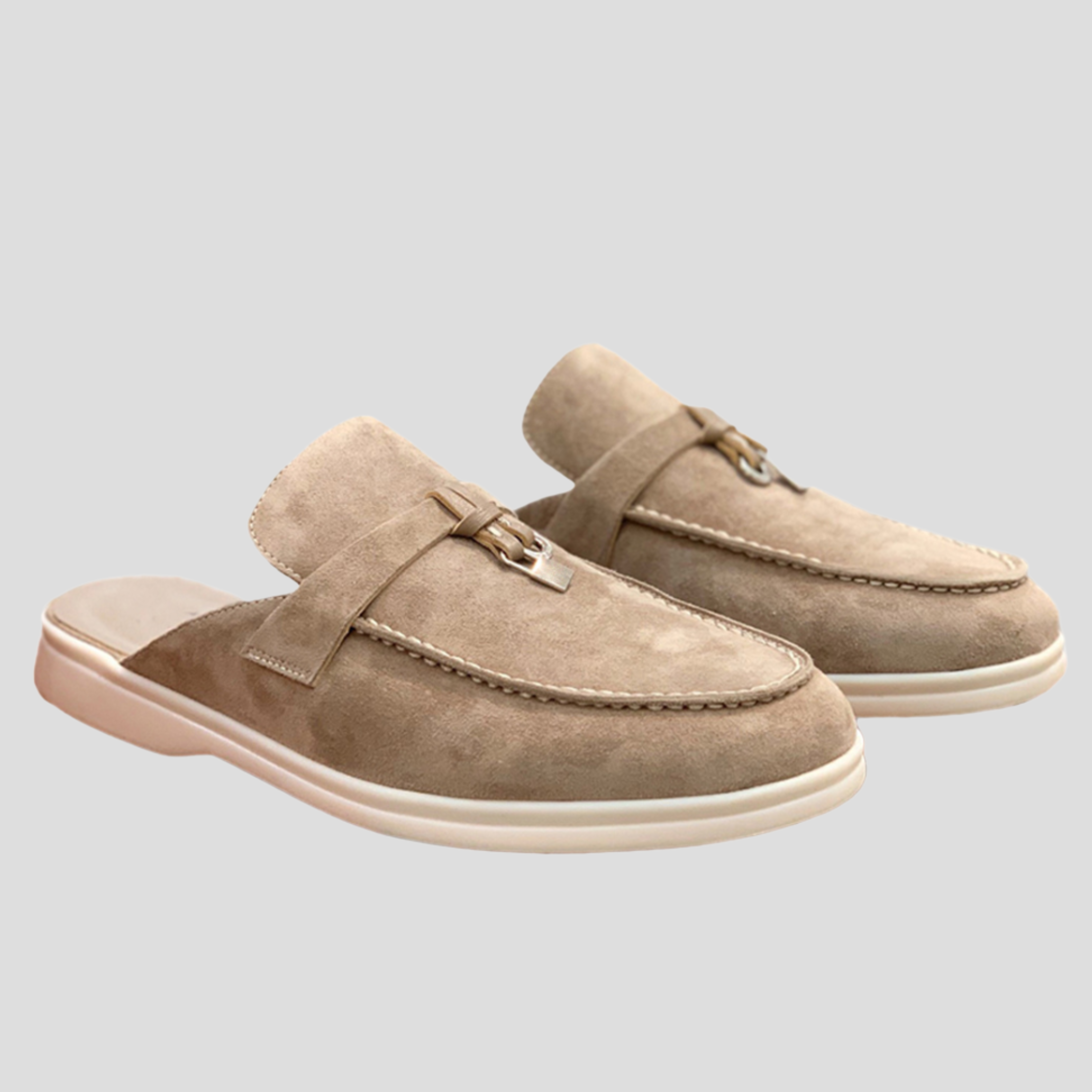 Women's backless loafer mules with tassel detail shown in multiple colors