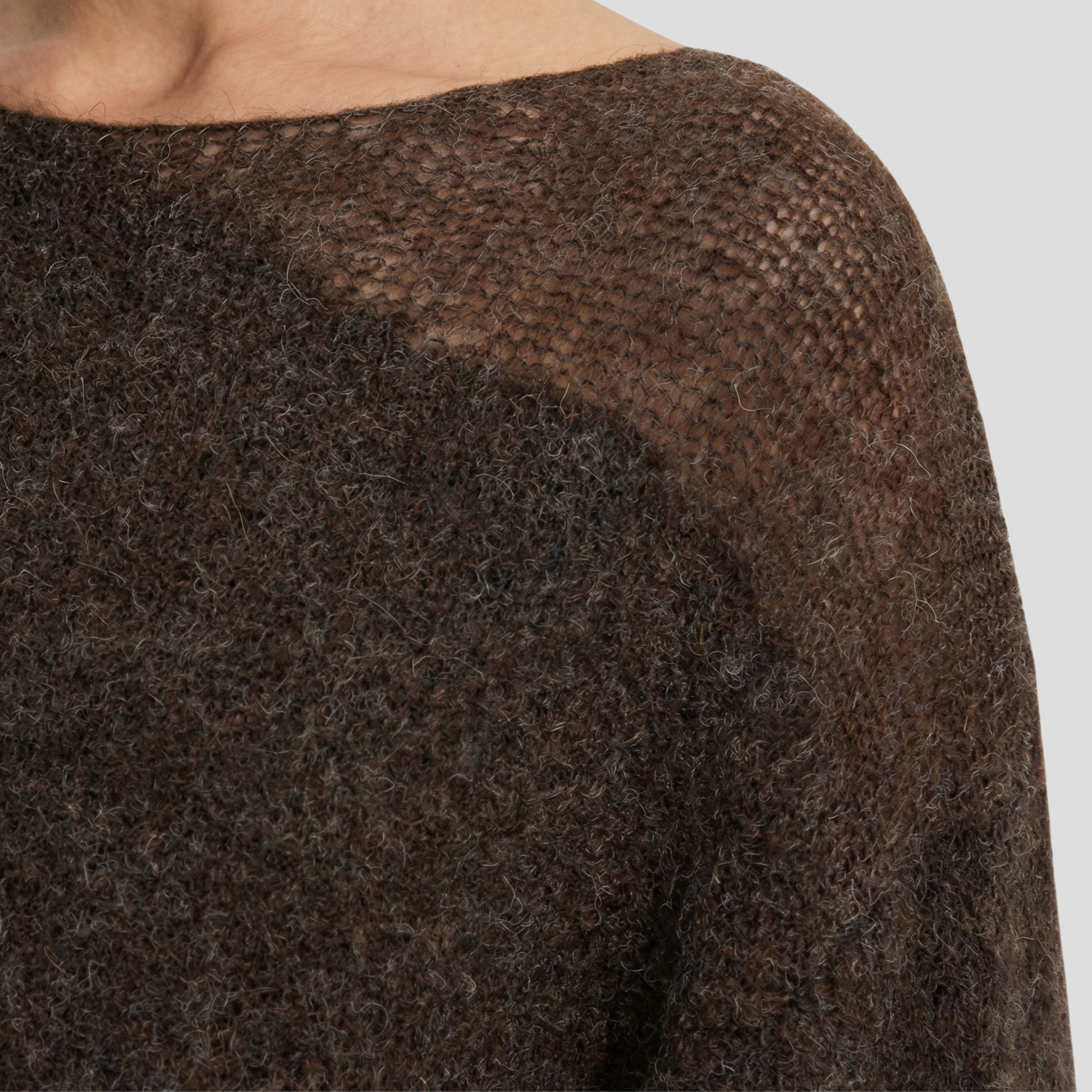 Brown women's boat neck sweater with relaxed draped silhouette and long sleeves