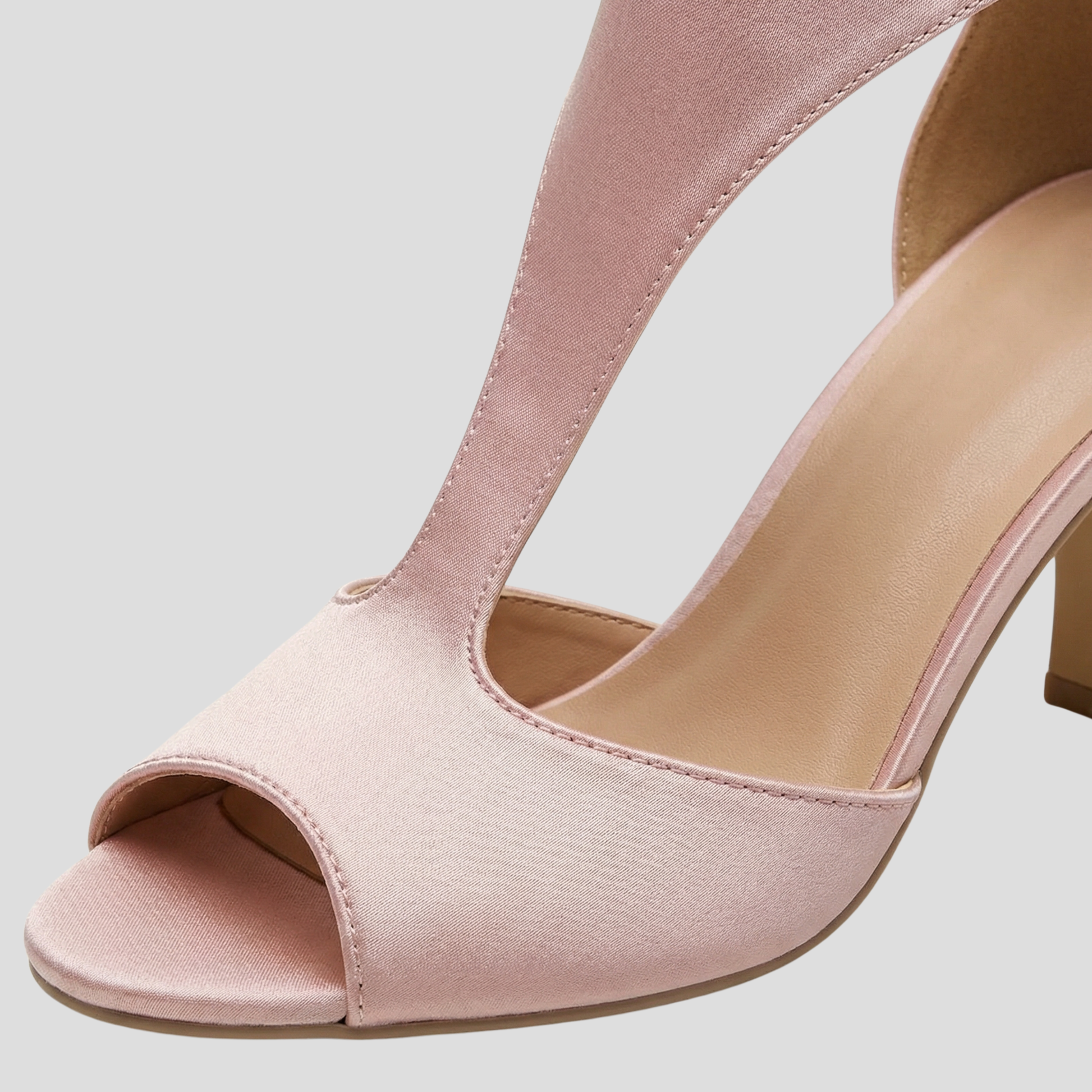 Women's sculpted cutout high-heel sandals with streamlined ankle strap in black and pink