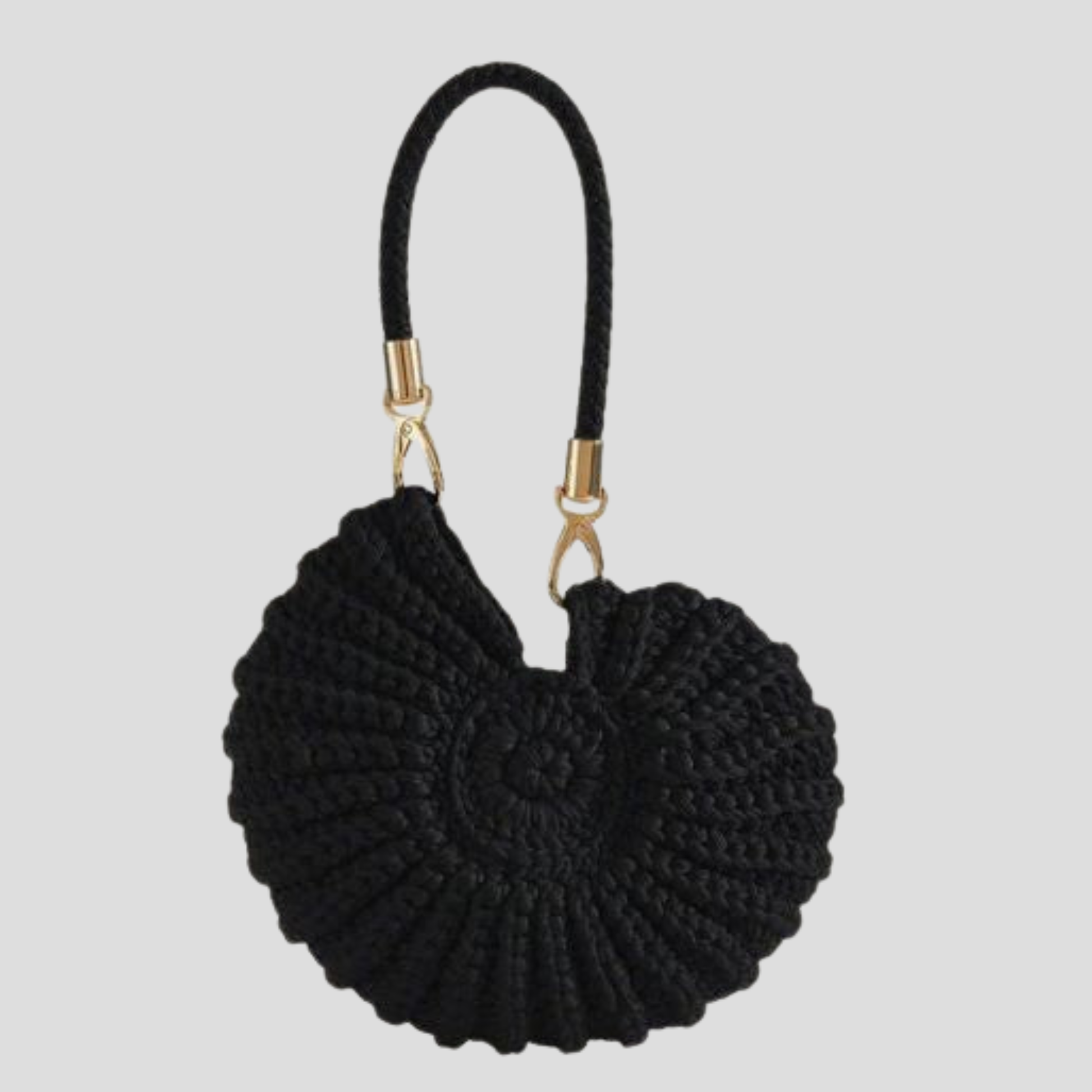 Conch-shaped woven handbag with sculptural silhouette, shown in blue, black, and white