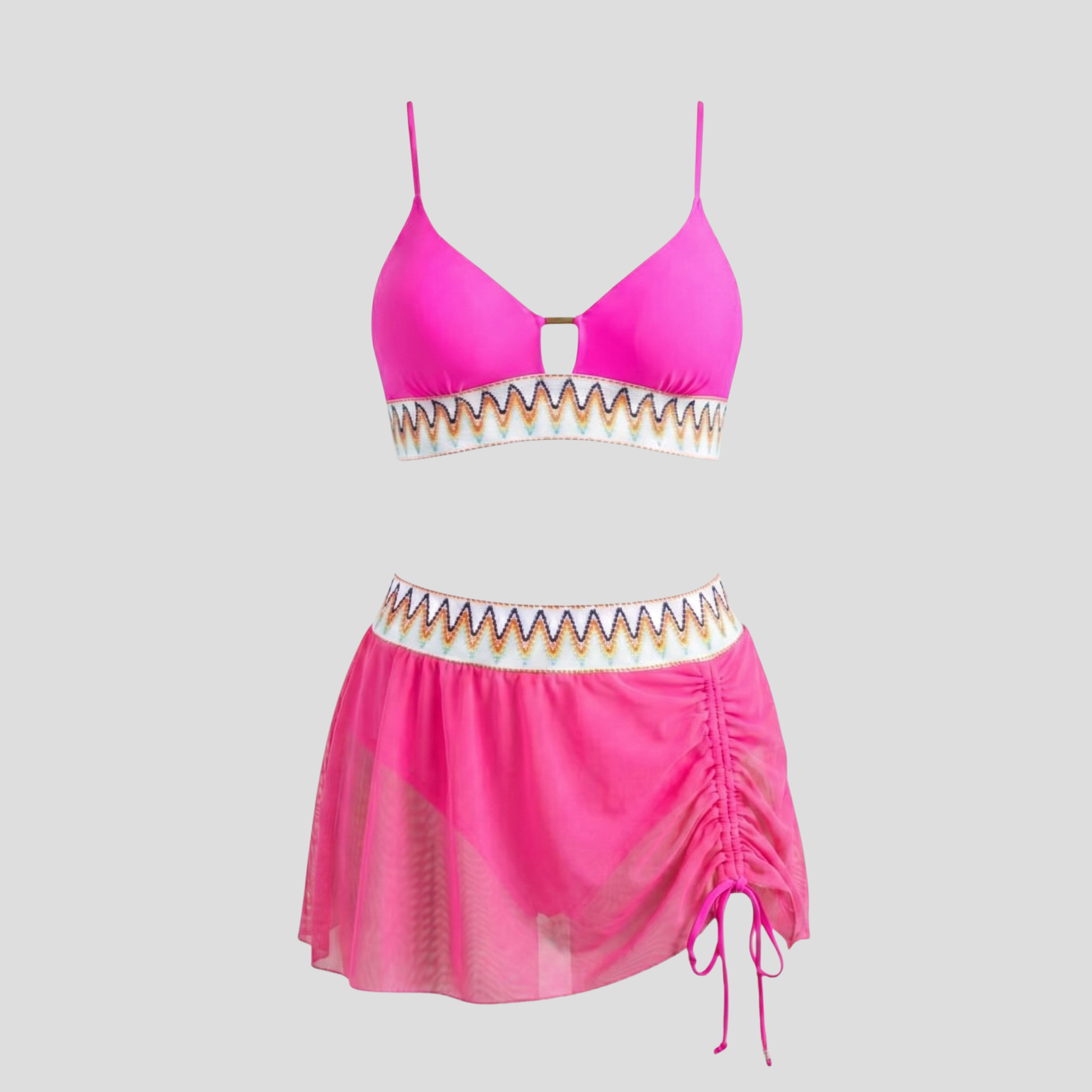 Women's three-piece swimwear set with embroidered waistband, metallic detail, and sheer tulle skirt