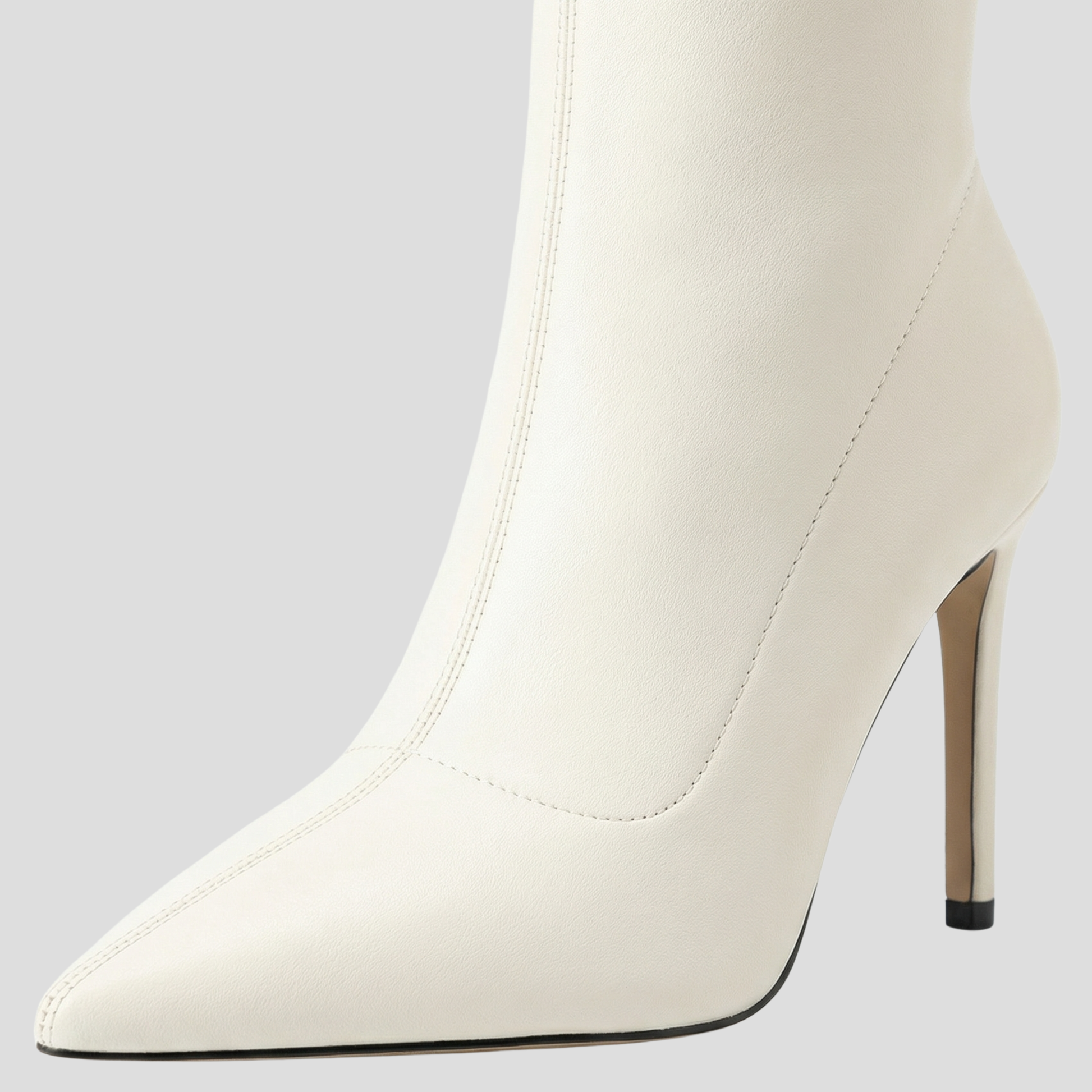 Women's knee-high pointed-toe boots with slim heel and side zip in black and white
