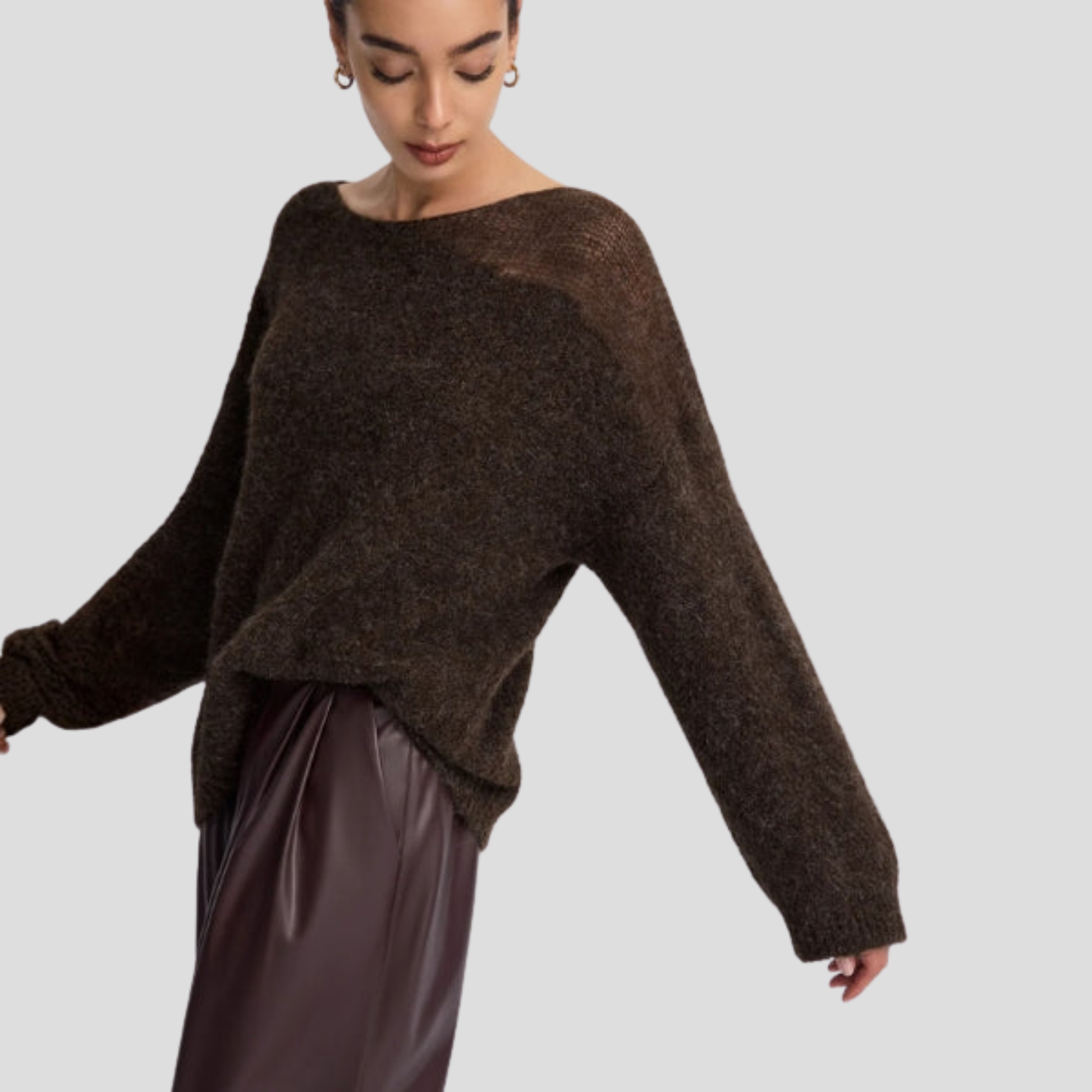 Brown women's boat neck sweater with relaxed draped silhouette and long sleeves