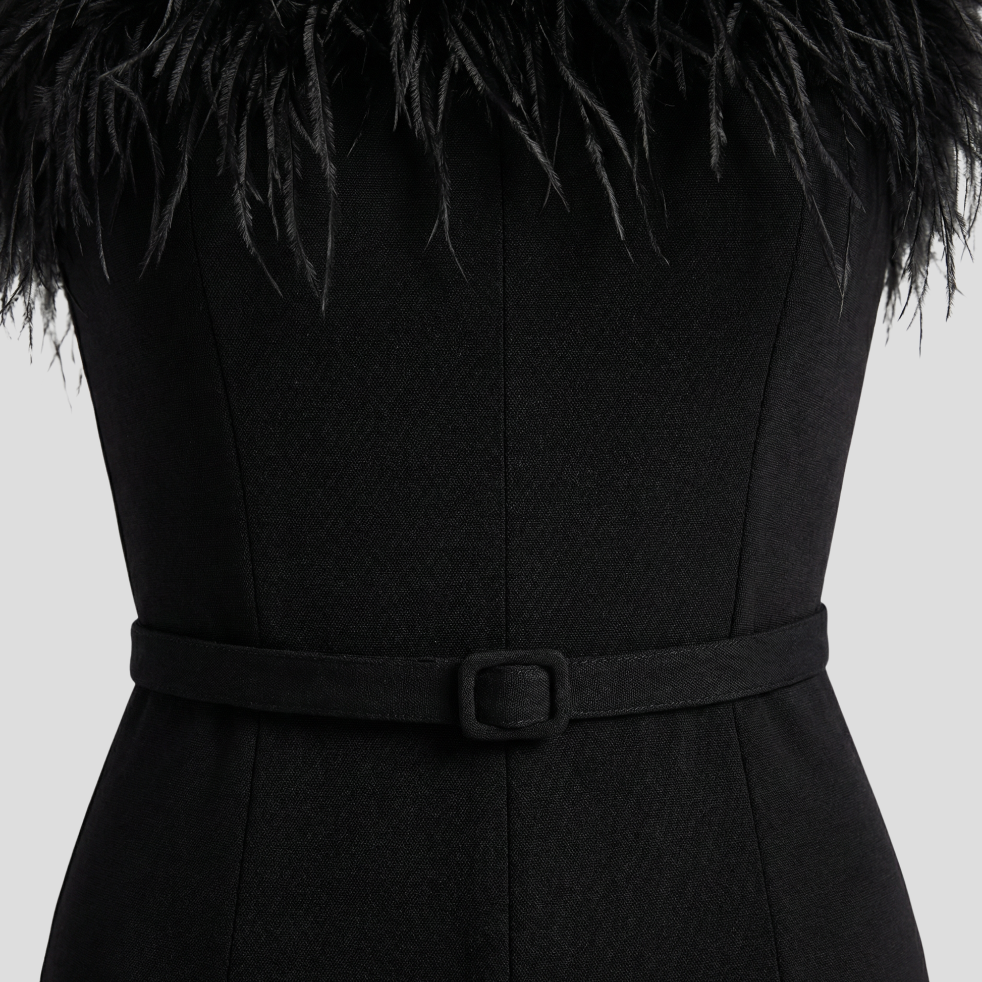 Women's strapless jumpsuit with feather-trim detail in white and black
