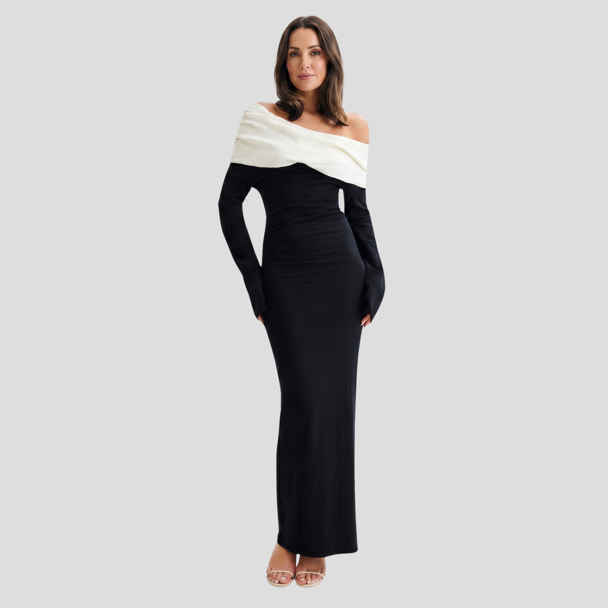 Black off-shoulder maxi dress with two-tone neckline detail and long sleeves
