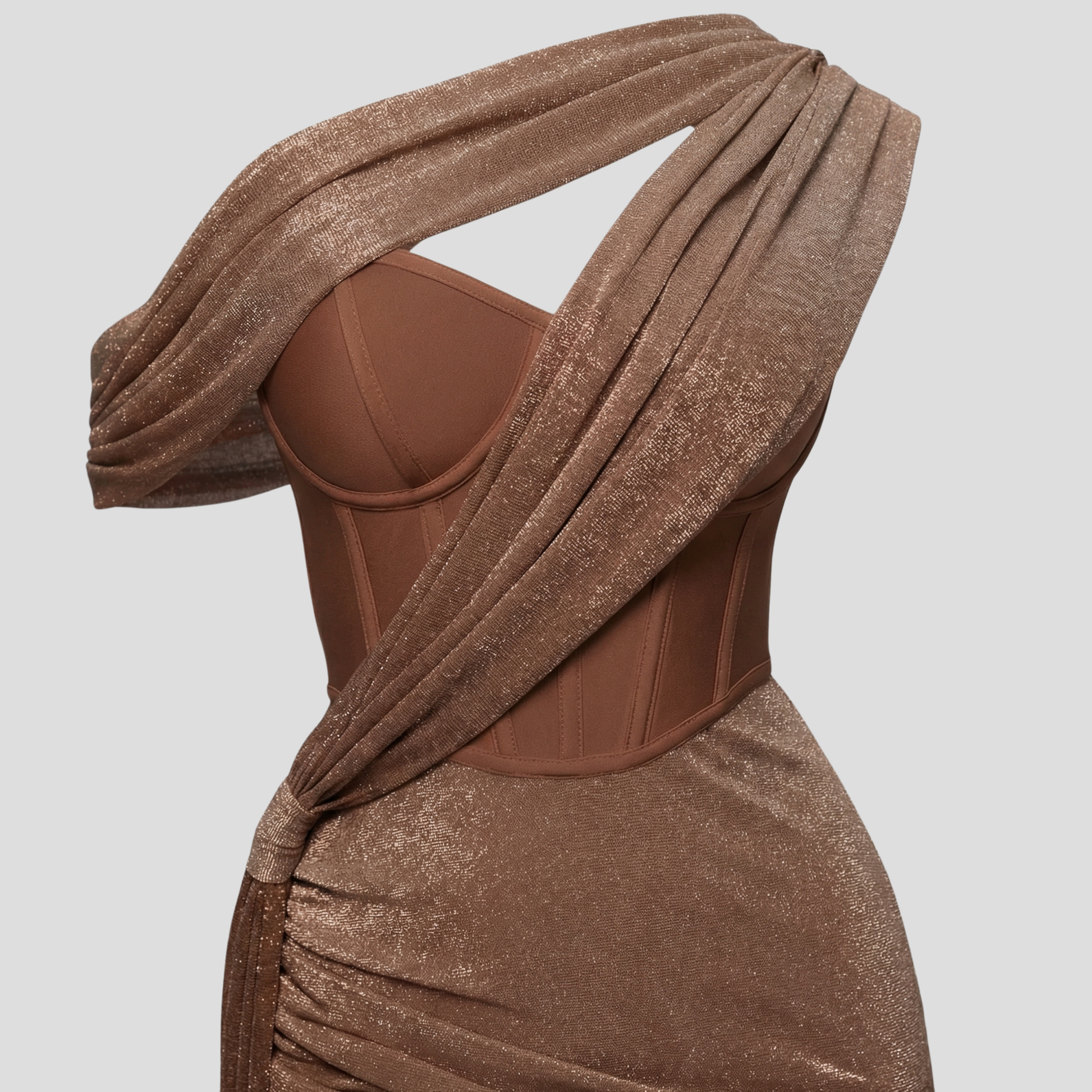 Woman wearing a one-shoulder draped floor-length maxi evening dress