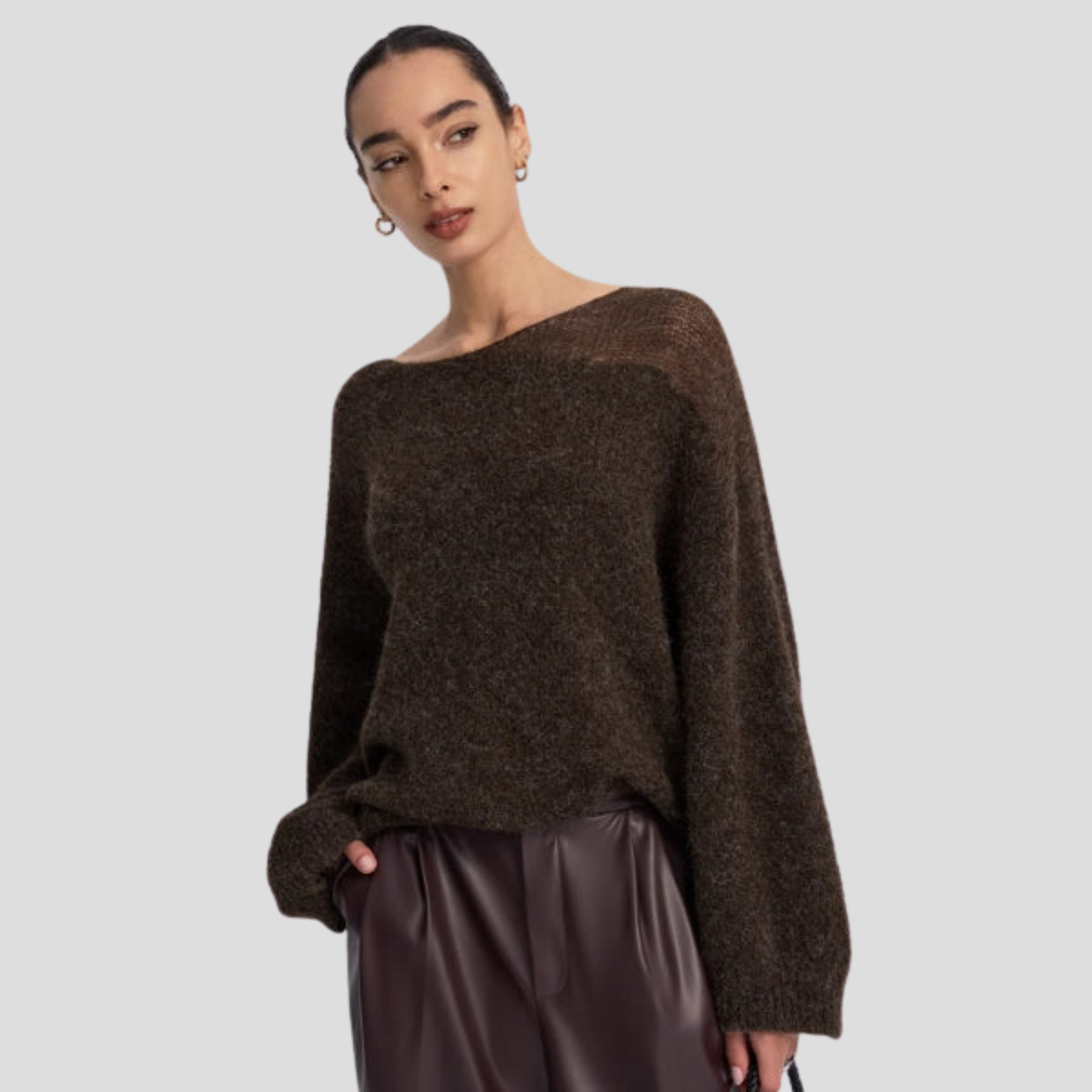Brown women's boat neck sweater with relaxed draped silhouette and long sleeves