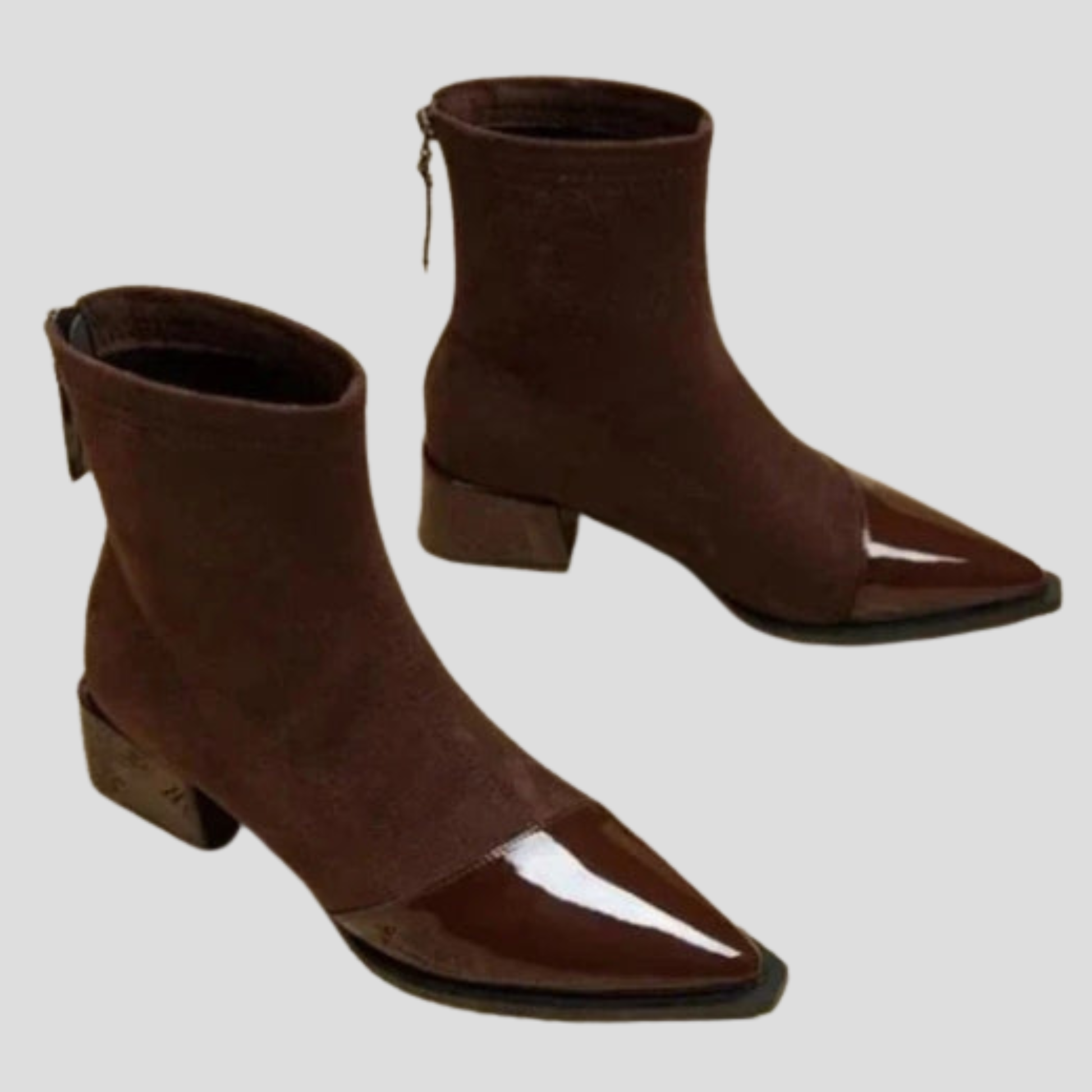 Women's ankle-height boots with contrast detail, shown in black and brown