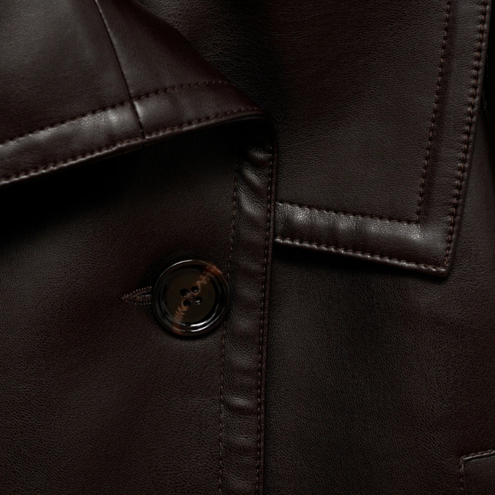 Brown cropped double-breasted women's jacket with defined collar and clean lines