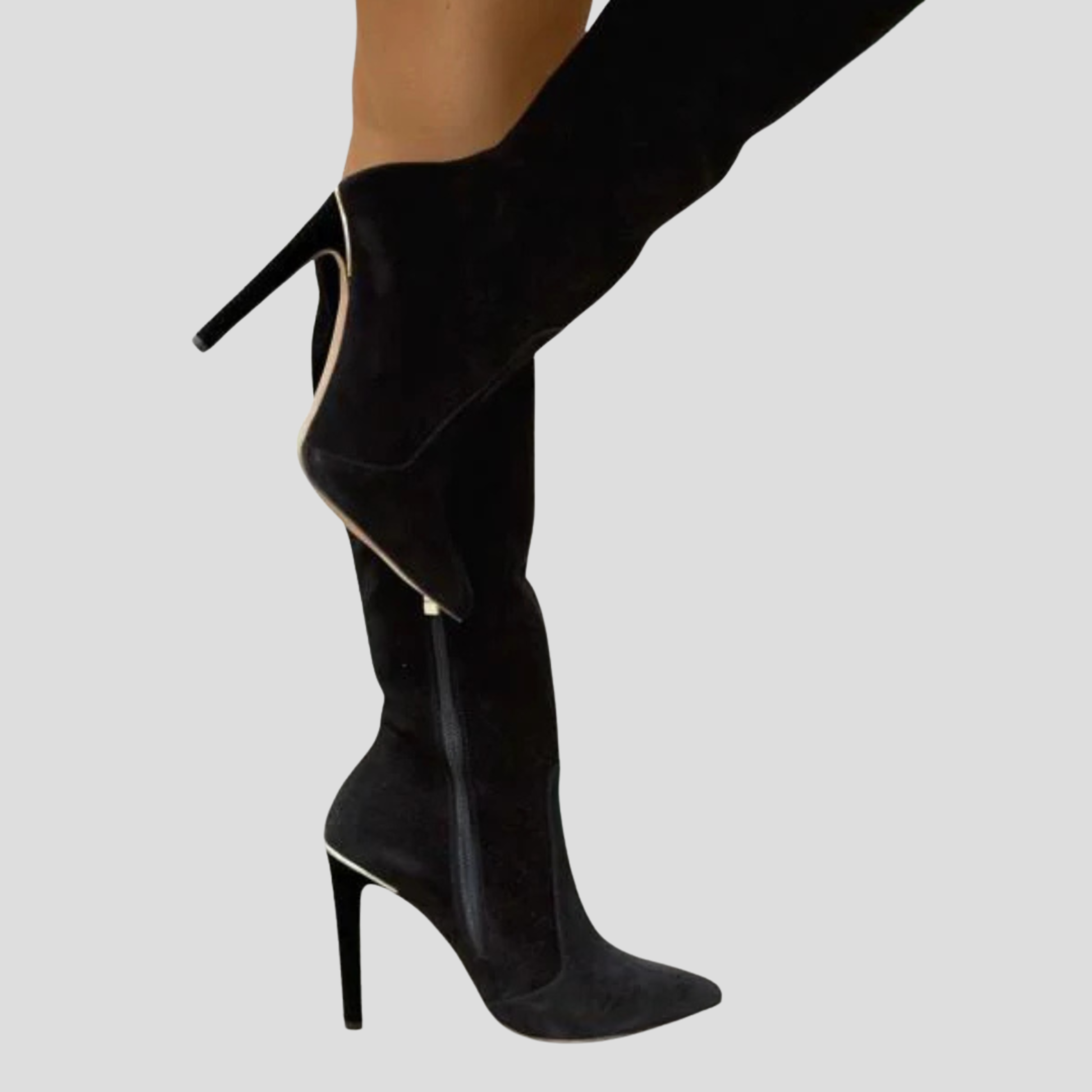 Knee-high pointed-toe women's boots with a slim heel and clean vertical silhouette