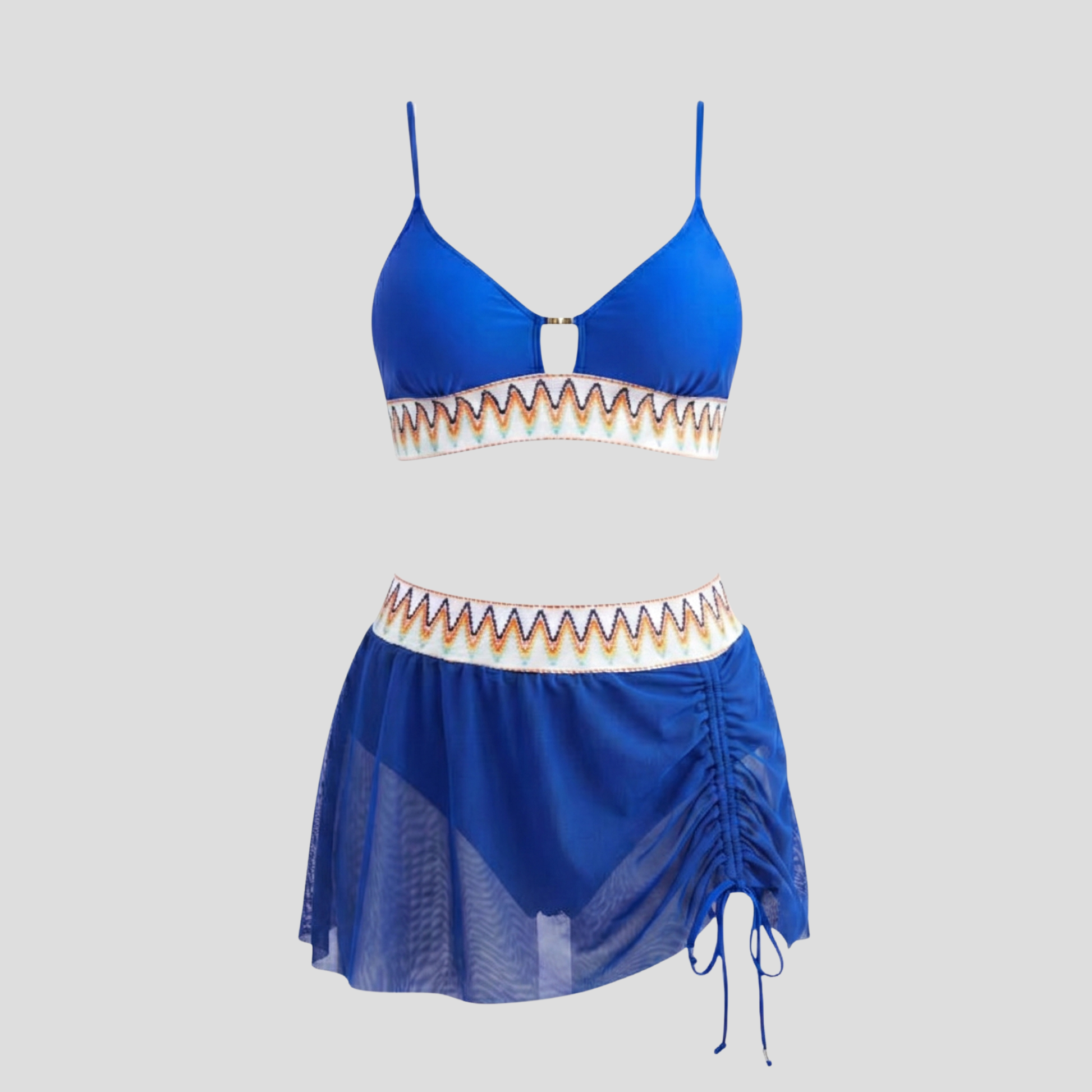 Women's three-piece swimwear set with embroidered waistband, metallic detail, and sheer tulle skirt