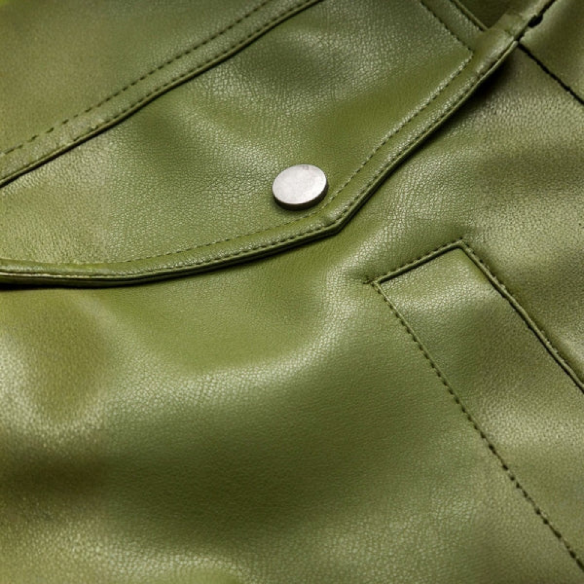 Green women's cropped bomber jacket with structured silhouette and ribbed hem