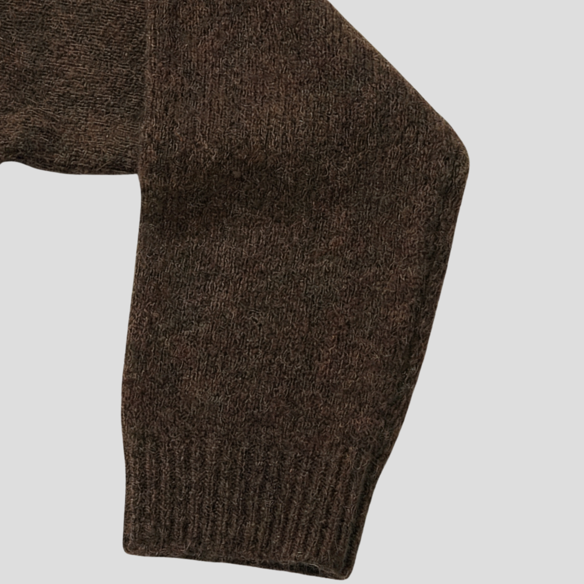 Brown women's boat neck sweater with relaxed draped silhouette and long sleeves