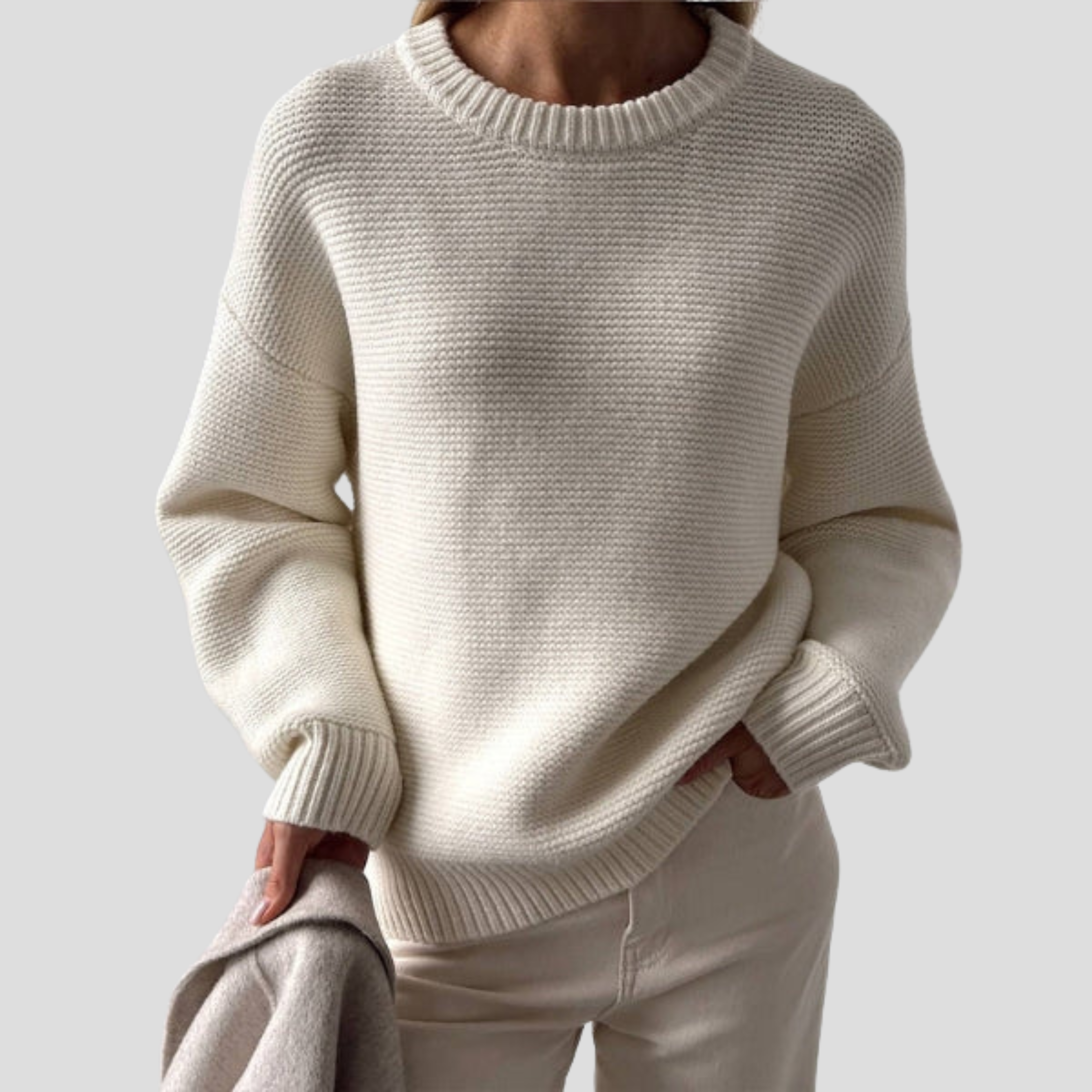Women's white textured crew neck sweater with a relaxed everyday silhouette