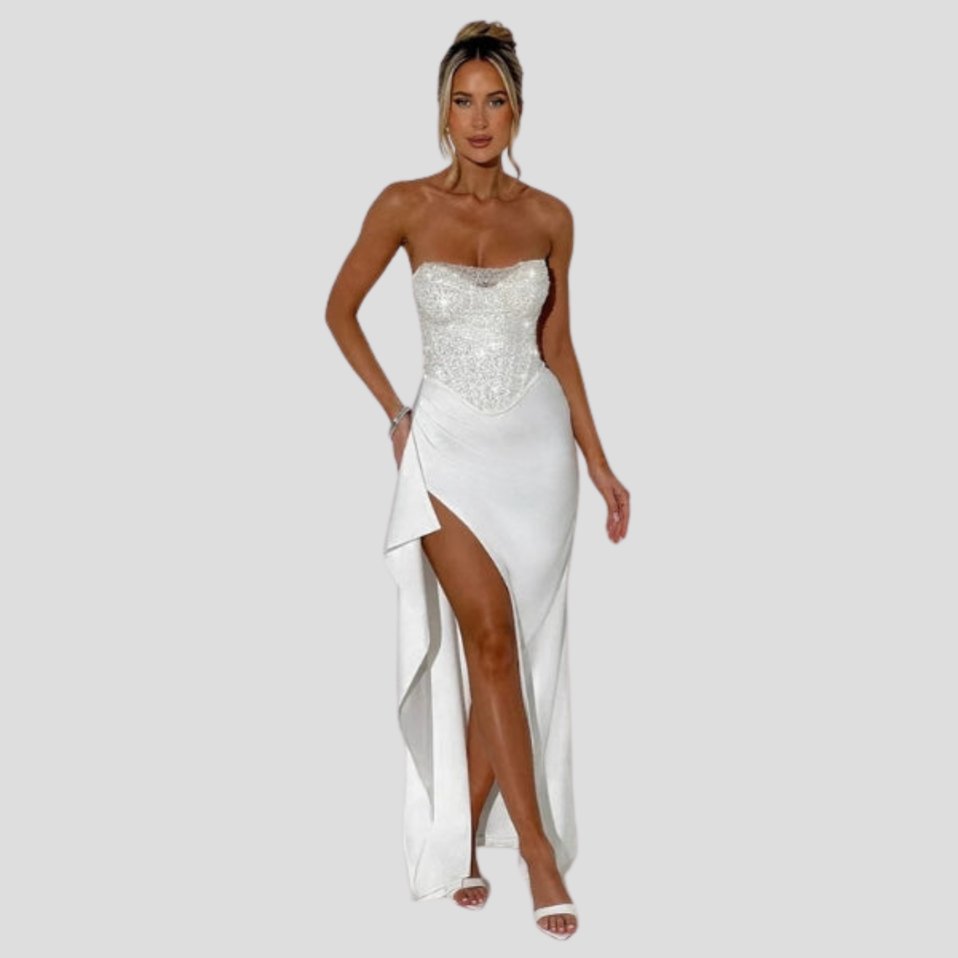 Strapless maxi evening gown with beaded bodice and high-slit skirt in black and white