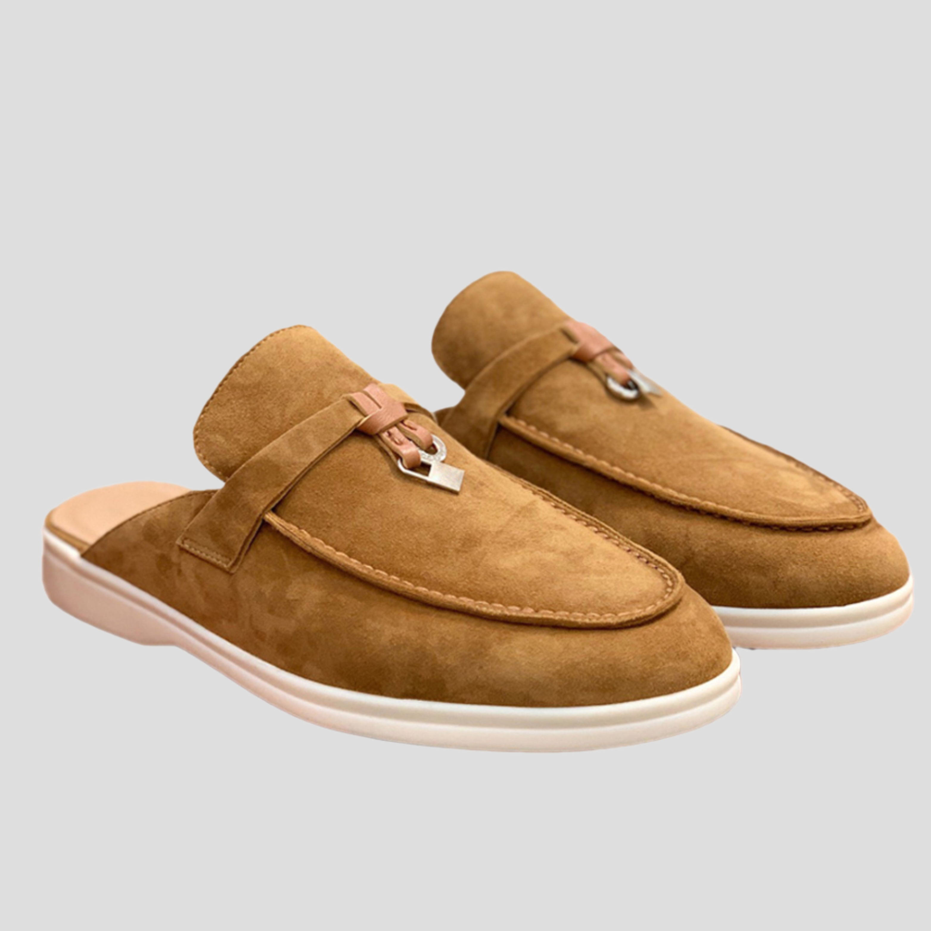 Women's backless loafer mules with tassel detail shown in multiple colors