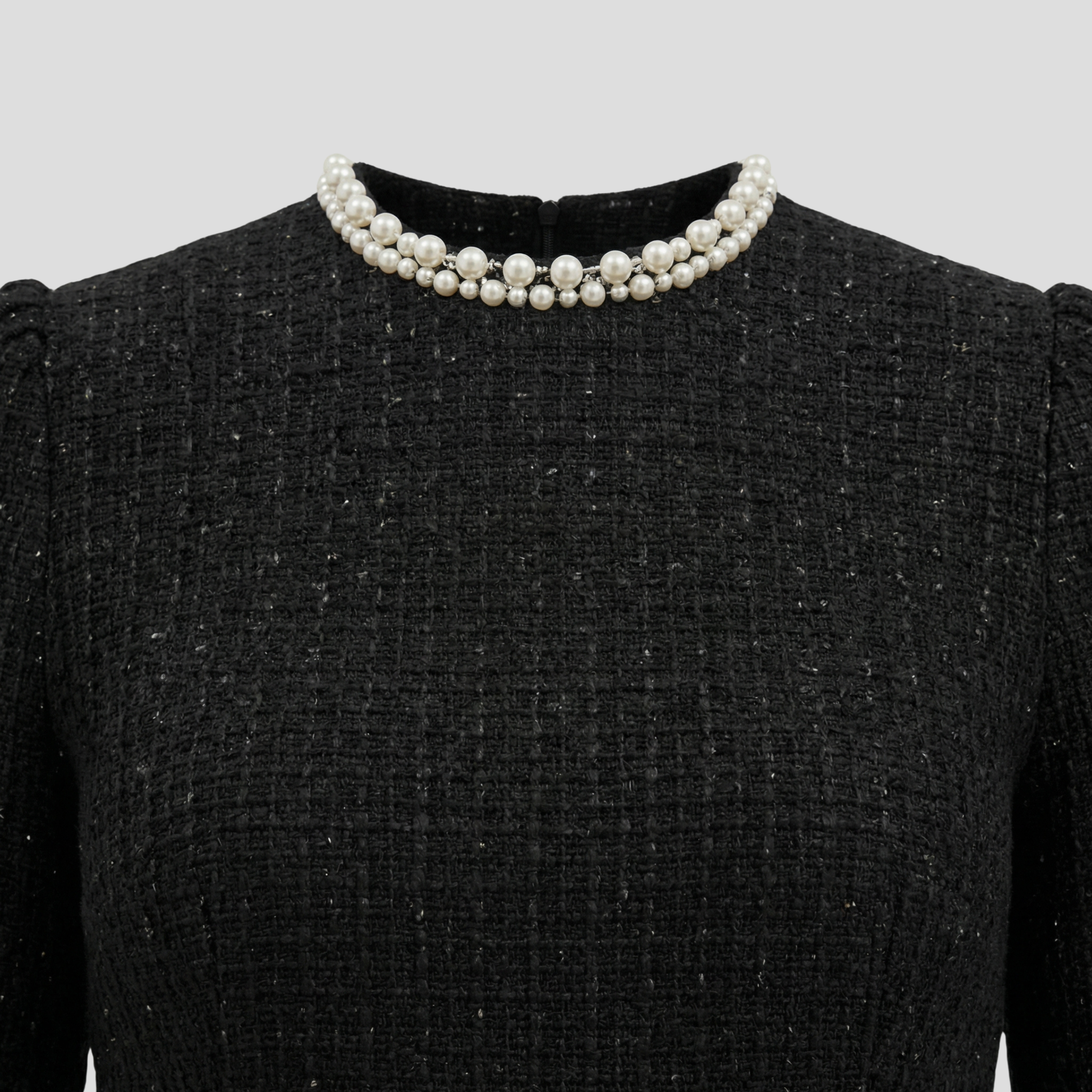 Structured mock neck mini dress with pearl-trim detailing in black and white