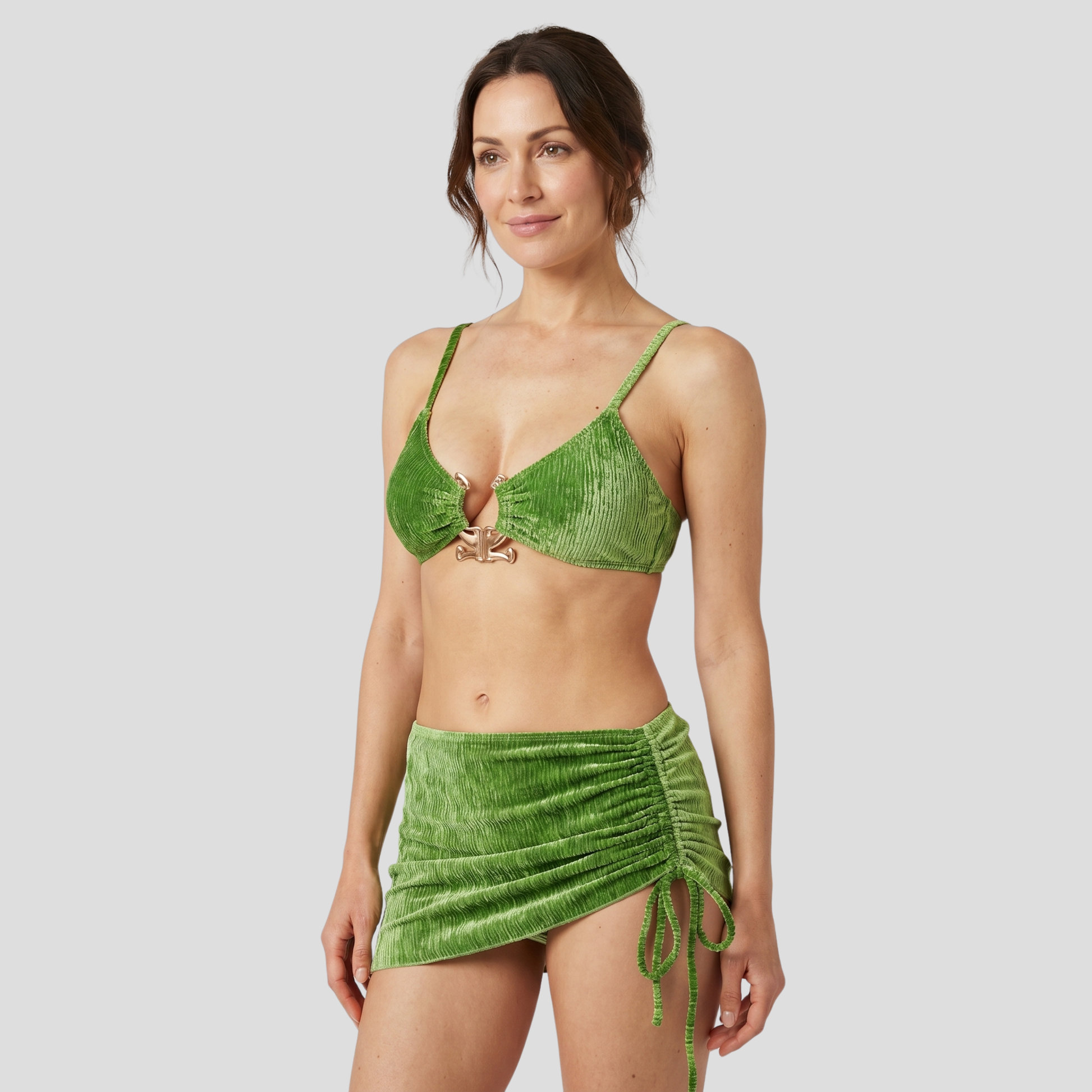Women's three-piece resort set with ruched bikini top, high-waisted bottoms, and drawstring mini skirt
