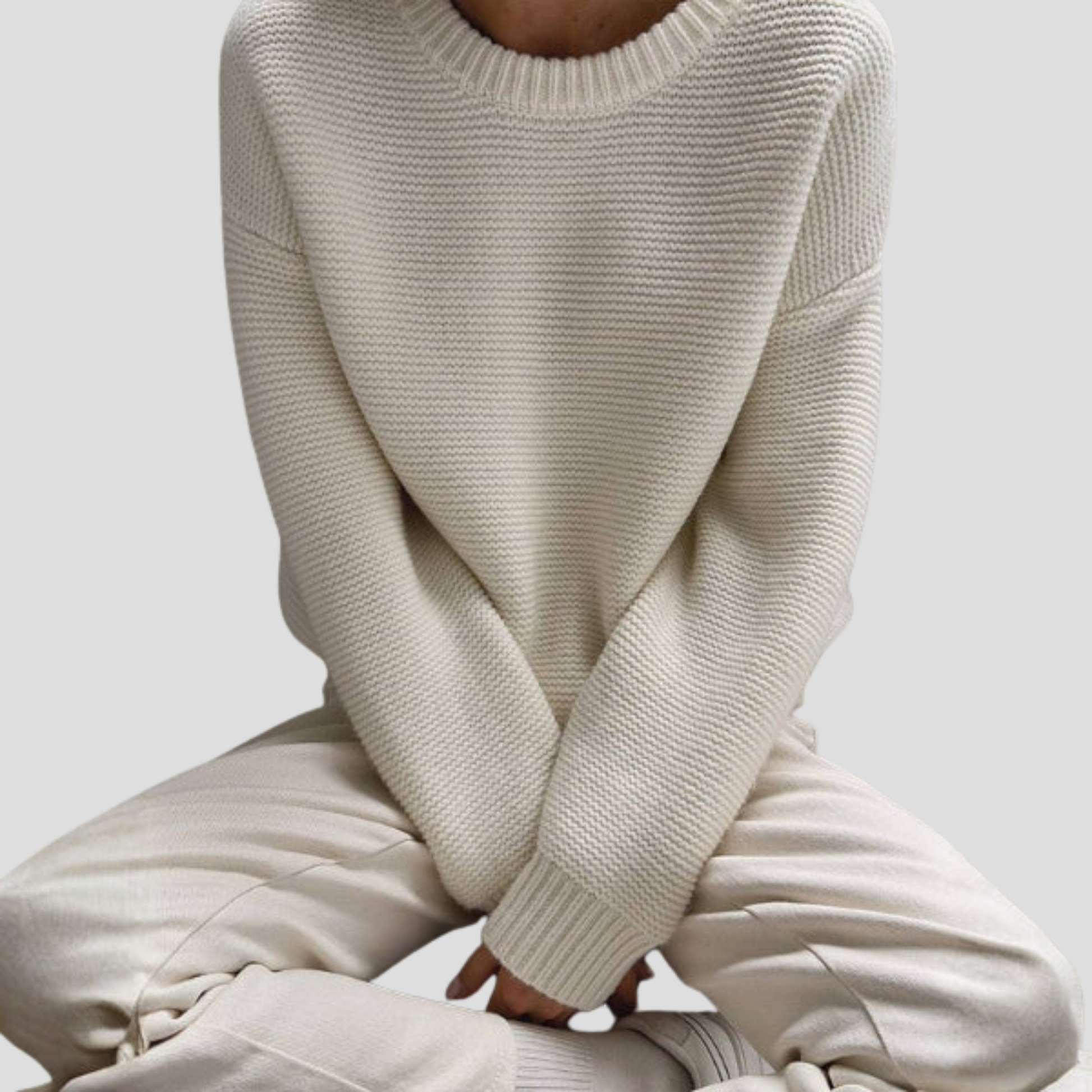 Women's white textured crew neck sweater with a relaxed everyday silhouette