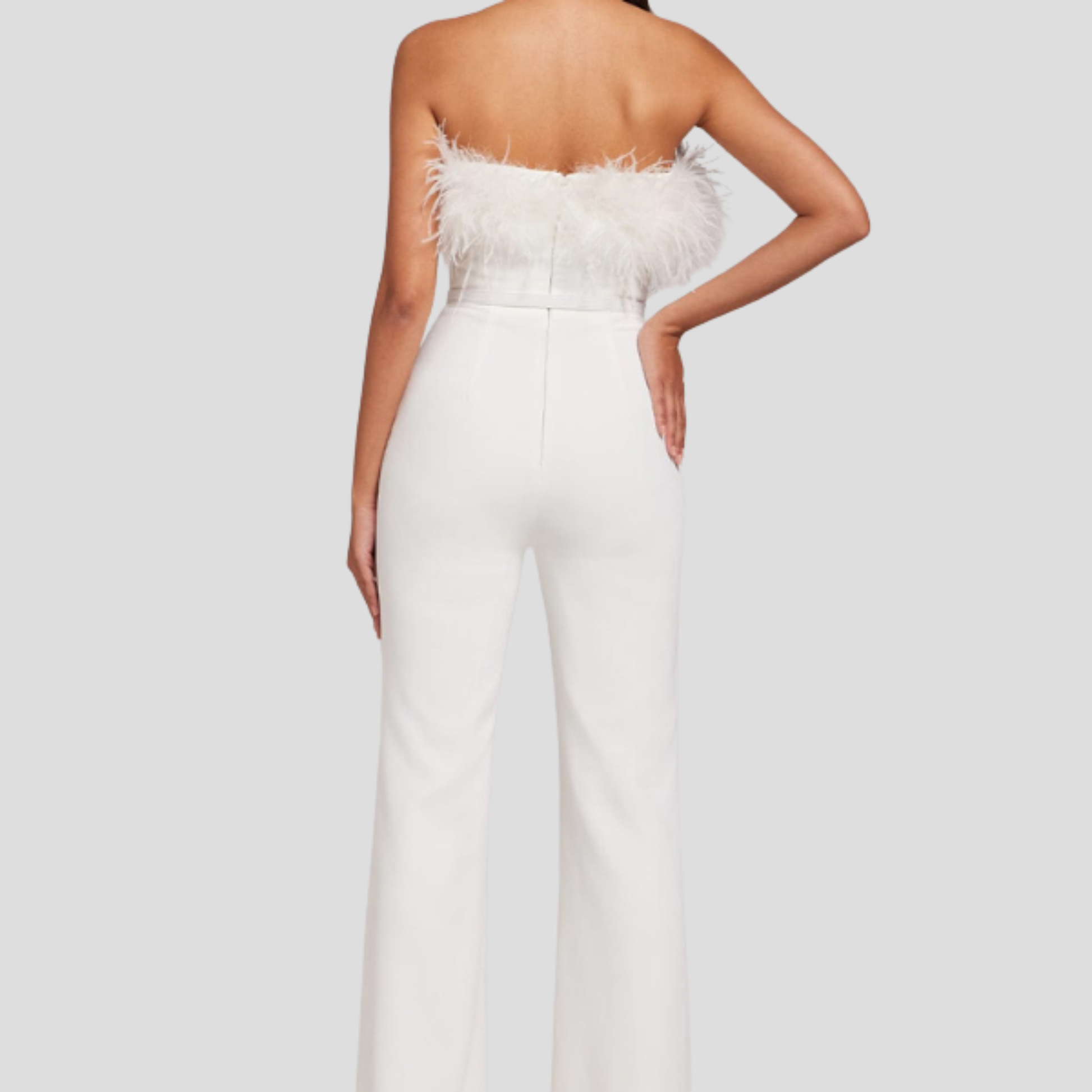Women's strapless jumpsuit with feather-trim detail in white and black