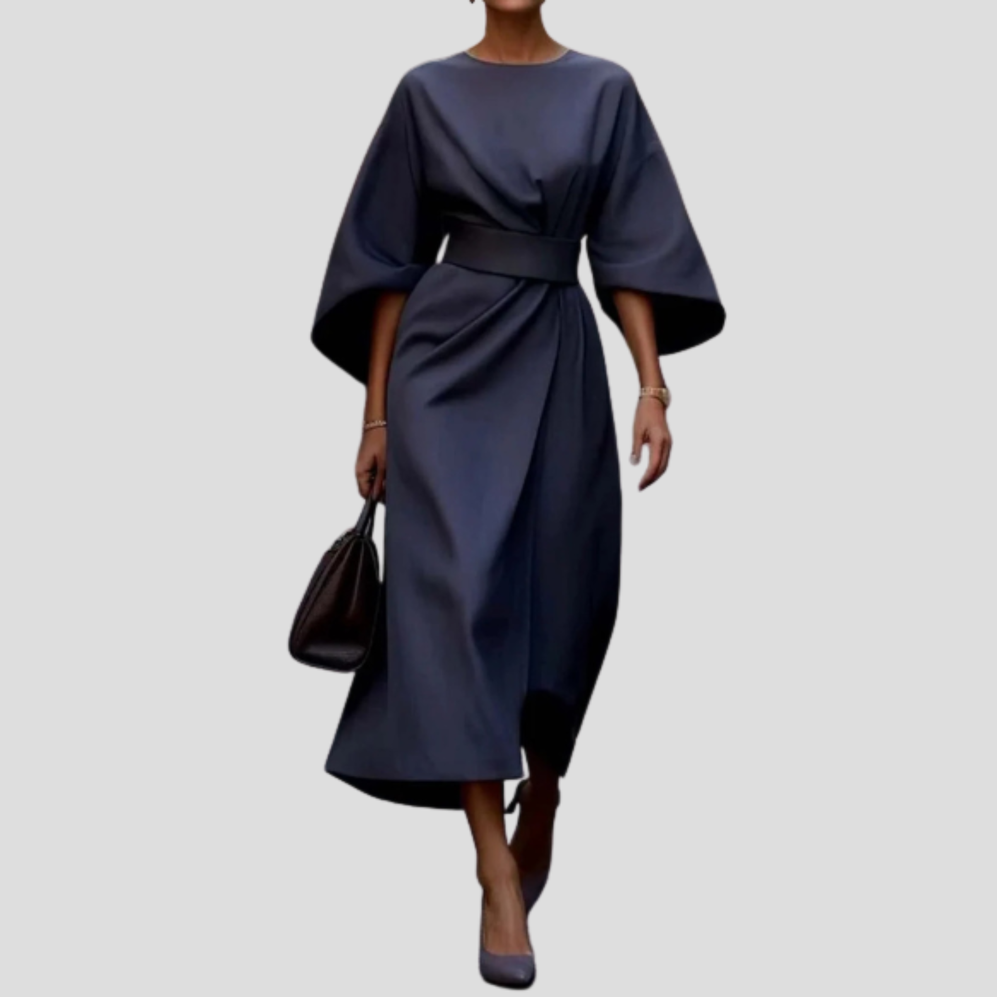 Women's belted floor-length maxi dress with a flowing skirt and defined waist