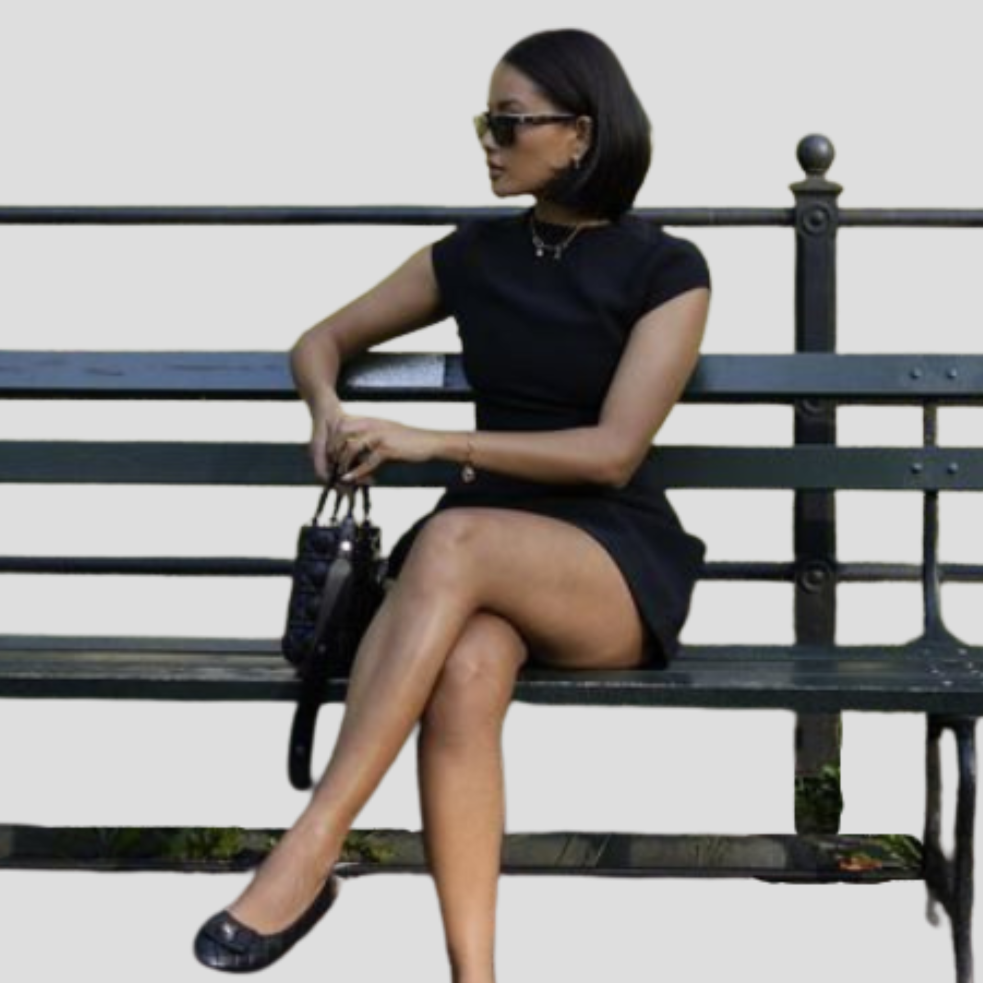 Women's cap sleeve mini dress with structured pocket flap detailing in black