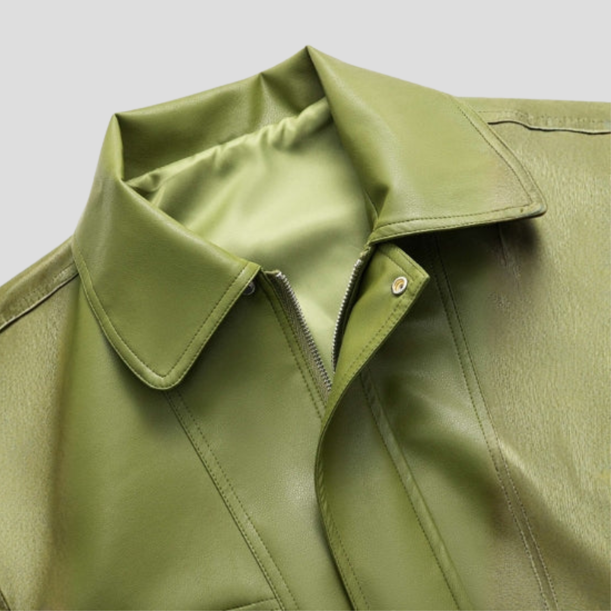 Green women's cropped bomber jacket with structured silhouette and ribbed hem