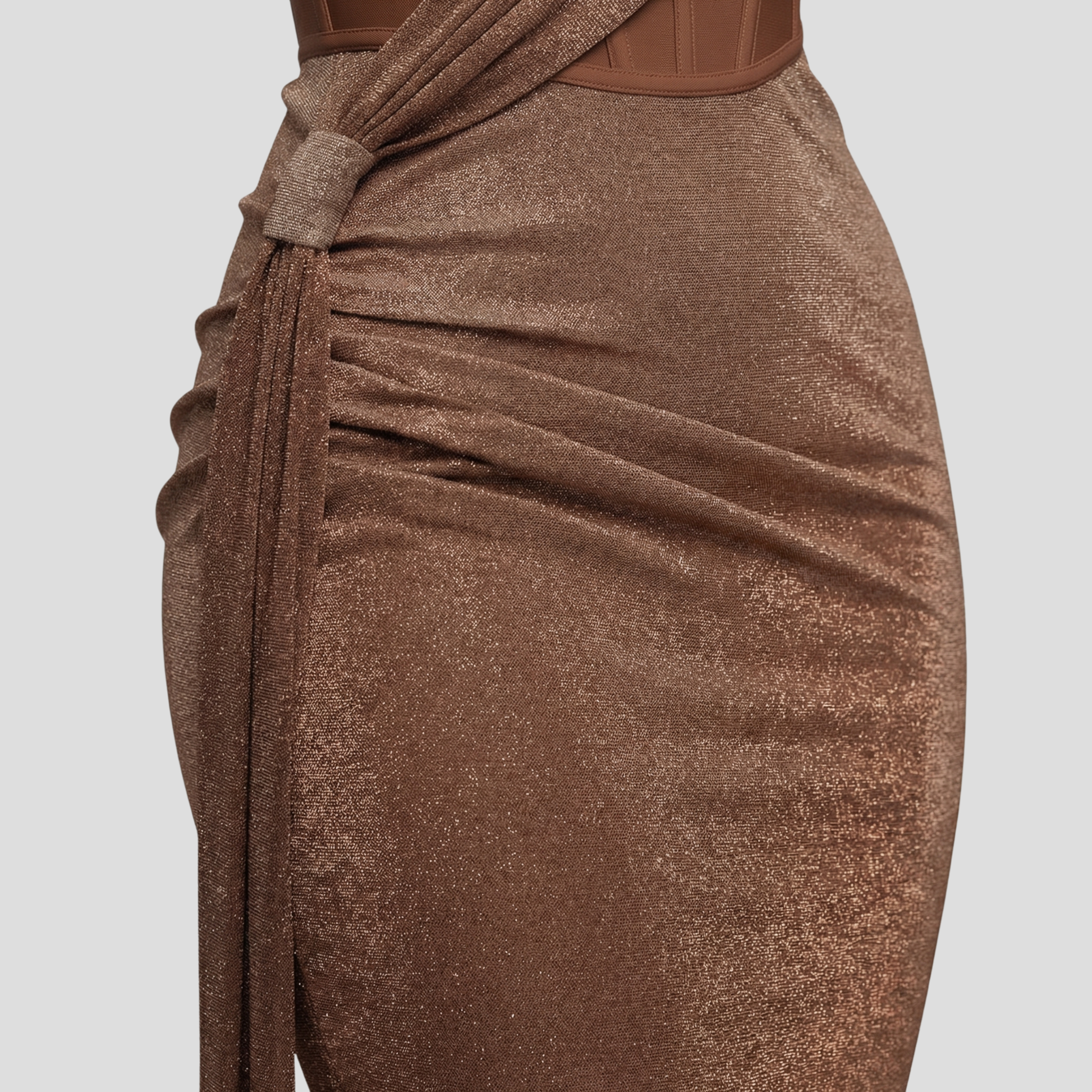 Woman wearing a one-shoulder draped floor-length maxi evening dress