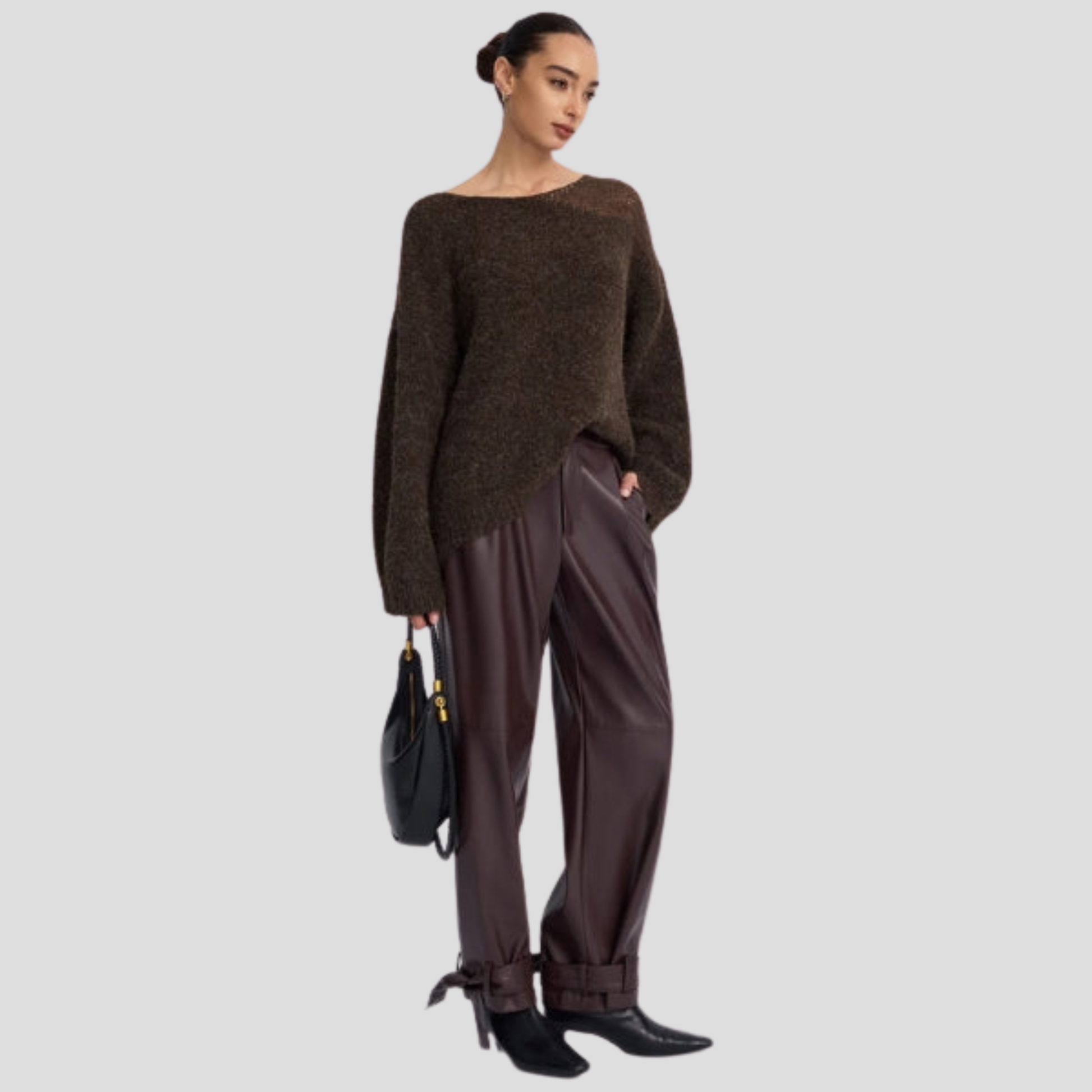 Brown women's boat neck sweater with relaxed draped silhouette and long sleeves