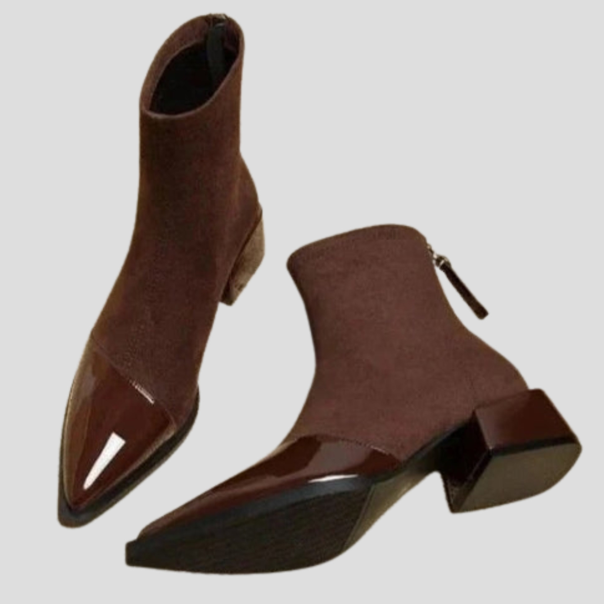 Women's ankle-height boots with contrast detail, shown in black and brown