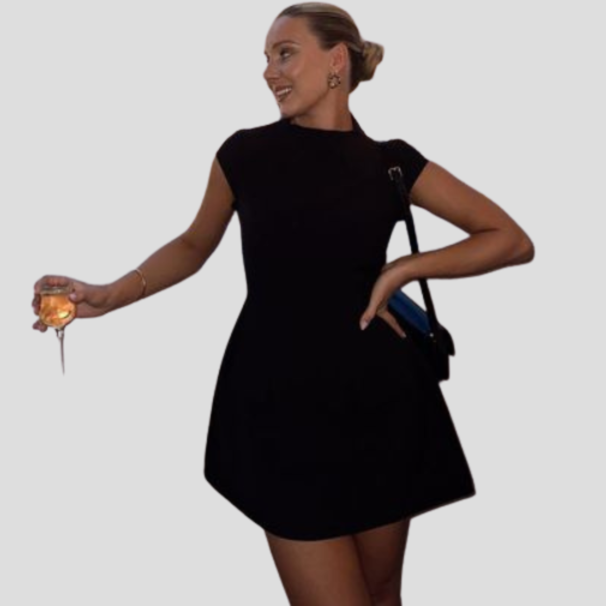 Women's cap sleeve mini dress with structured pocket flap detailing in black