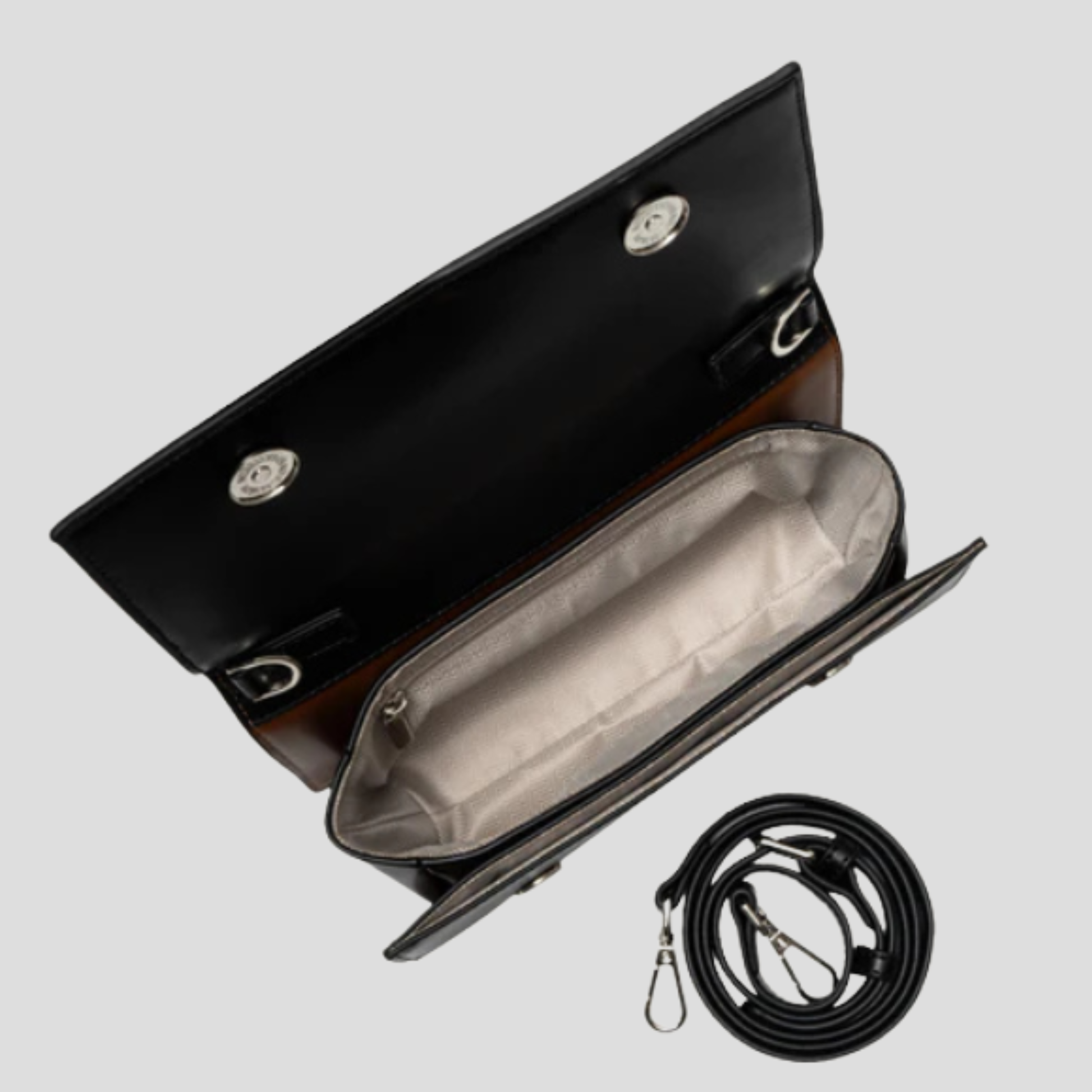 Black structured women's handbag with two-tone handle detail for daily wear