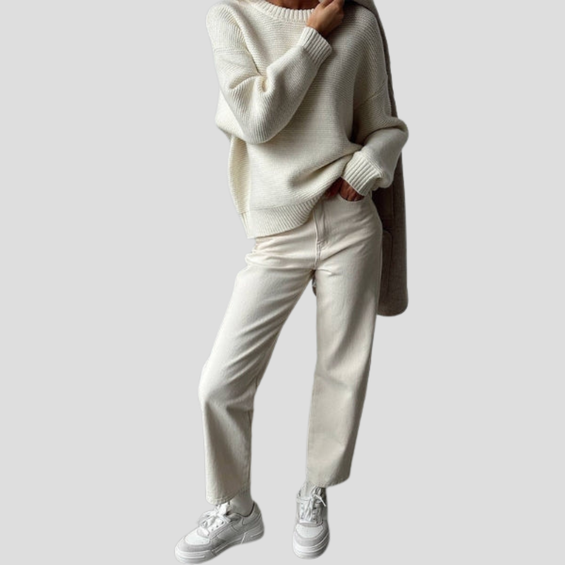 Women's white textured crew neck sweater with a relaxed everyday silhouette