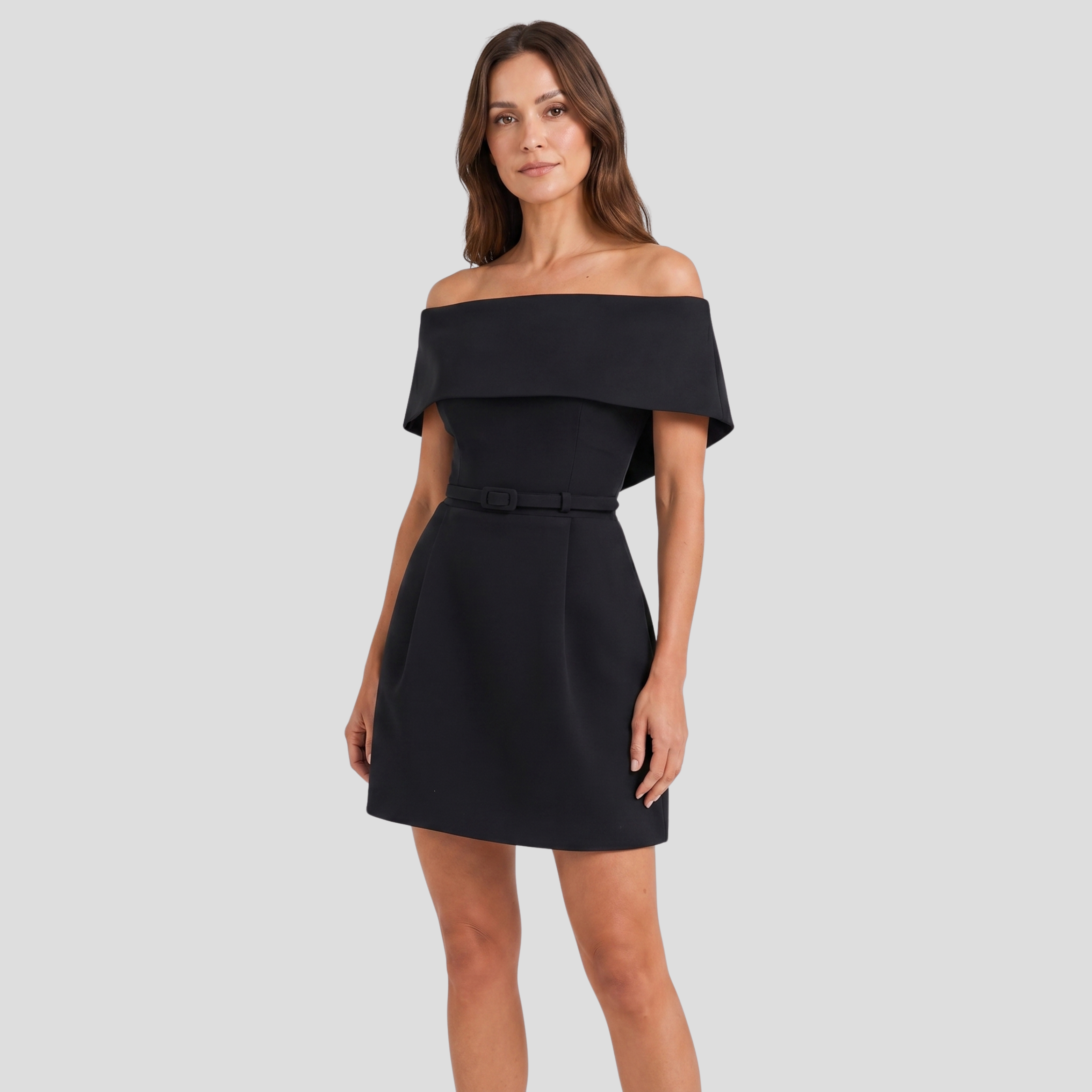 Black off-shoulder mini dress with belted waist and gently flared pleated skirt