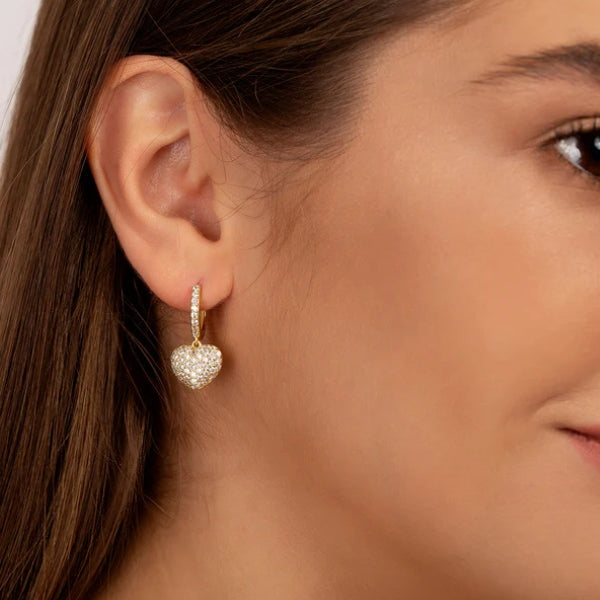 Heart charm pavé drop earrings shown in gold and silver finishes