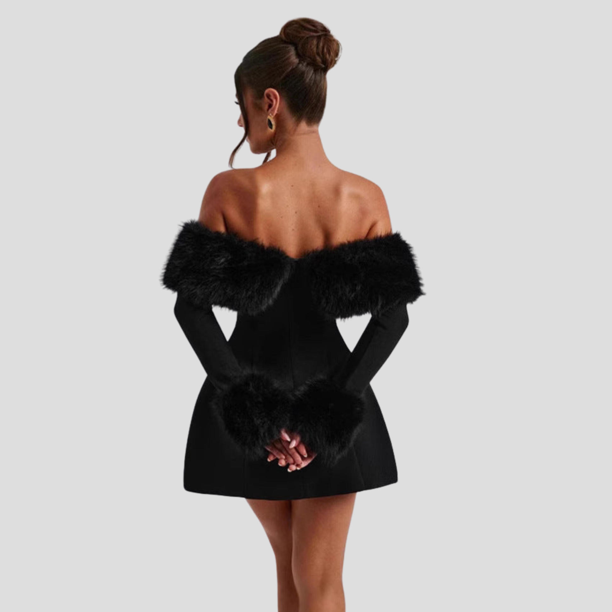 Black off-shoulder mini dress with flared hem for evening wear
