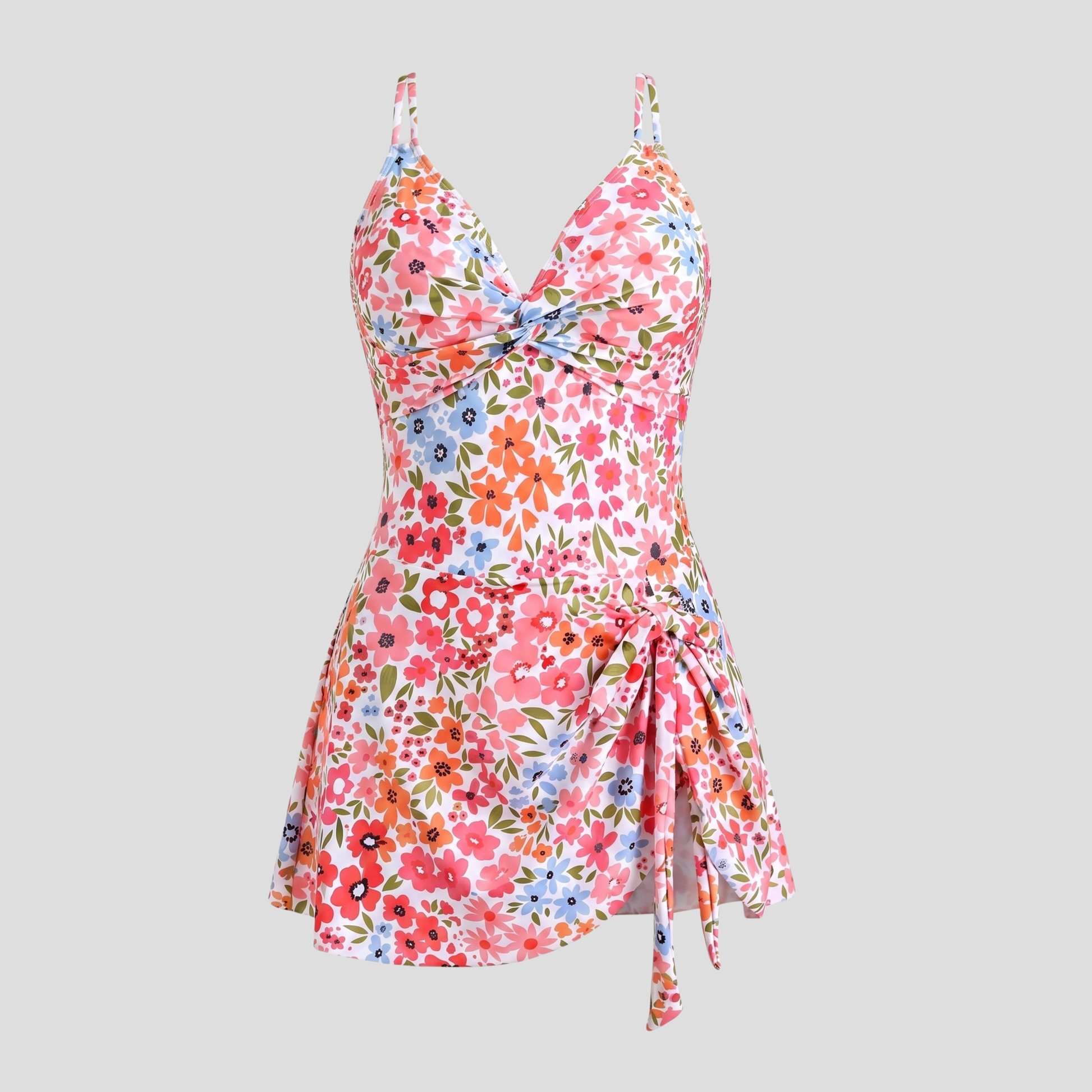 Women's twist-front one-piece swimsuit with skirted overlay and crossover back