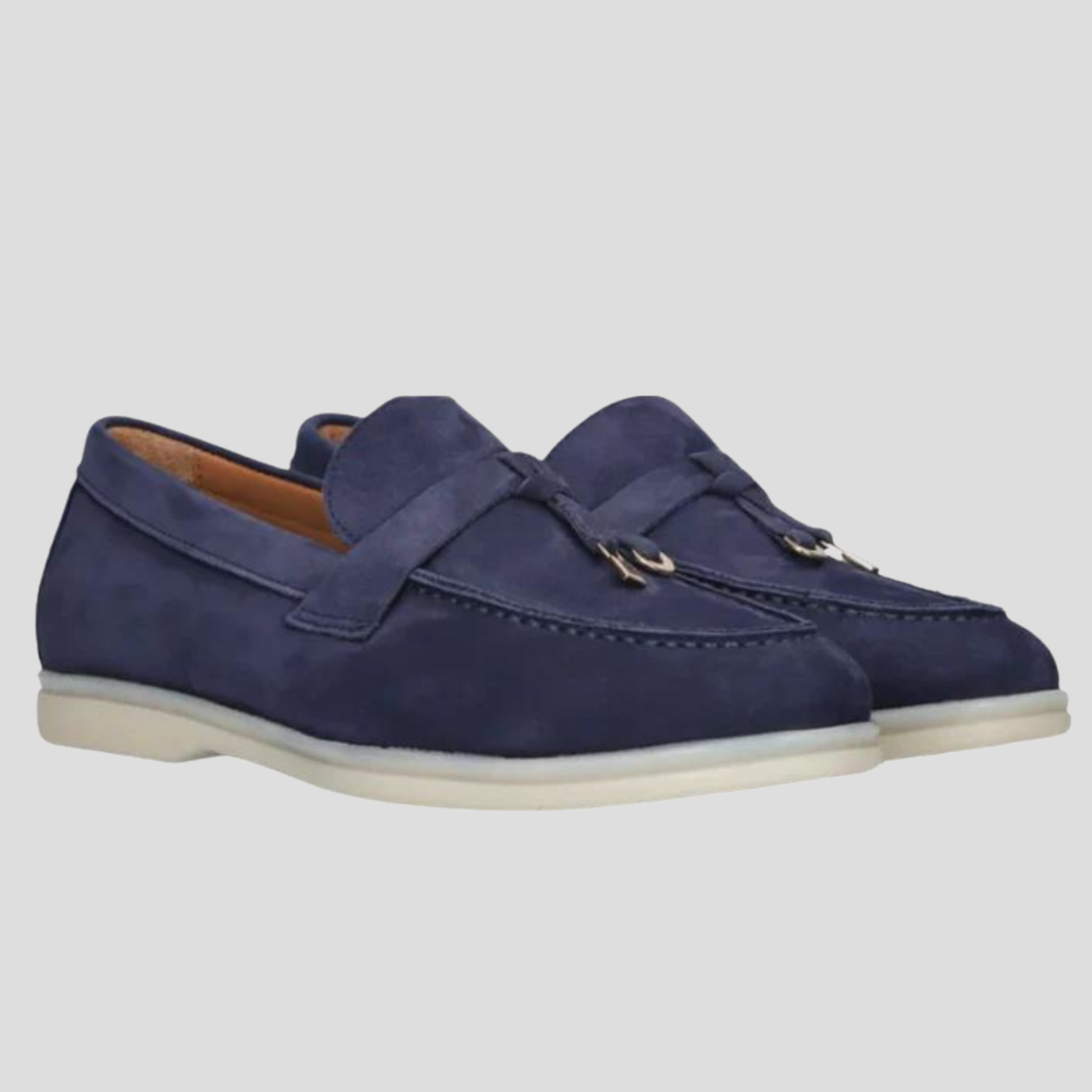 Women's tassel slip-on loafers with a clean silhouette, shown in a neutral colorway