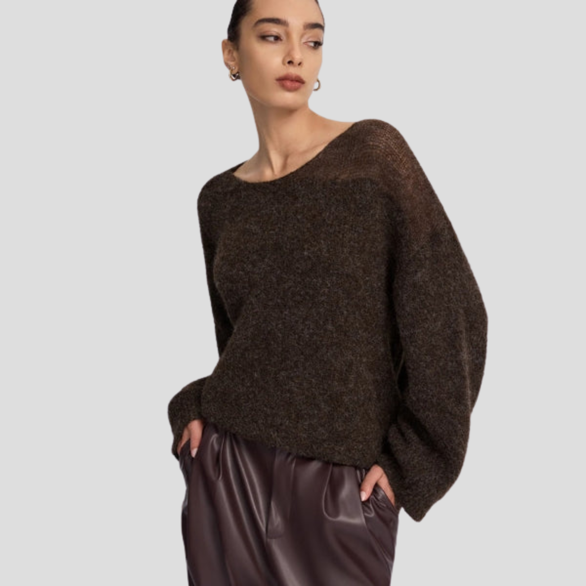 Brown women's boat neck sweater with relaxed draped silhouette and long sleeves