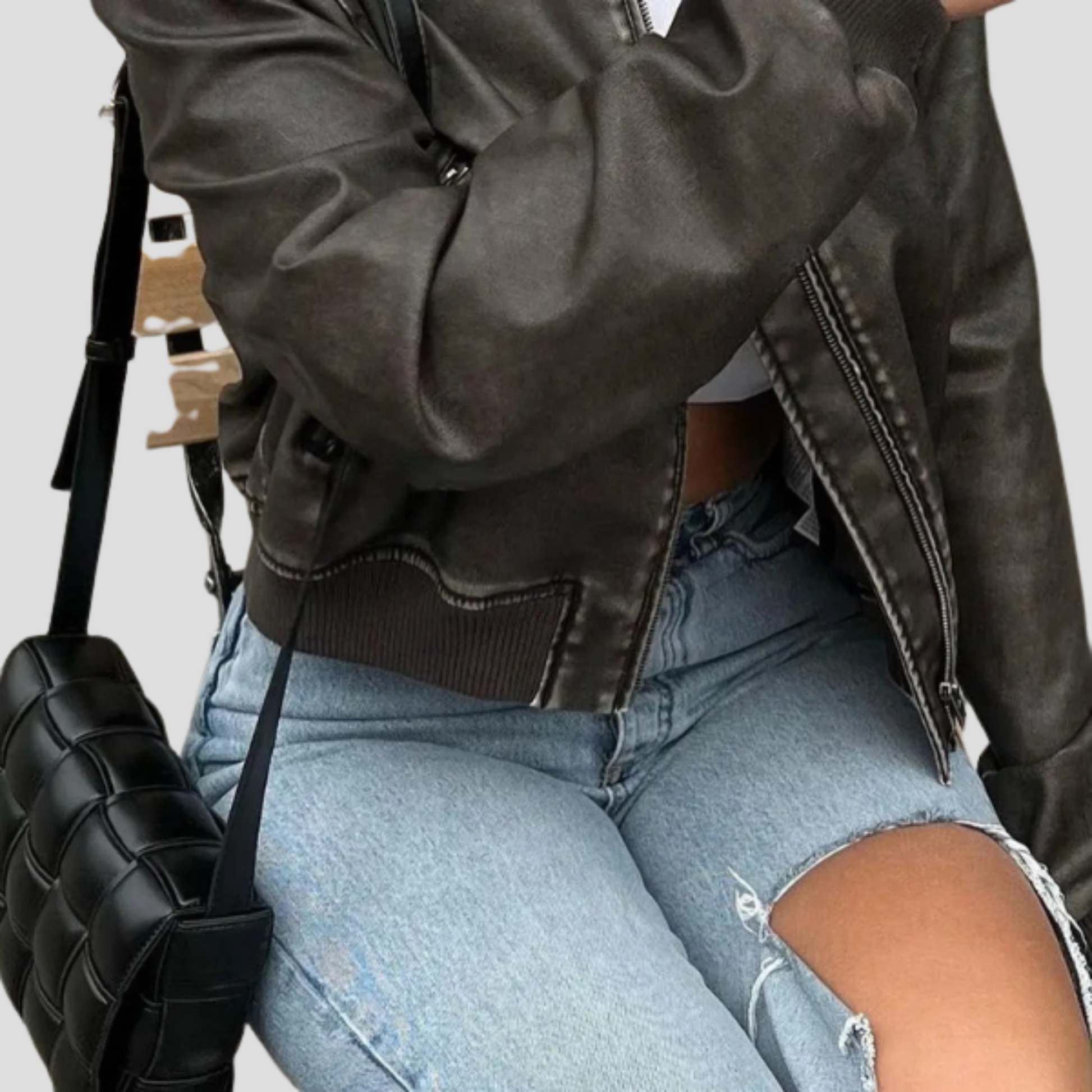 Brown women's jacket with ribbed cuffs and hem and a streamlined silhouette