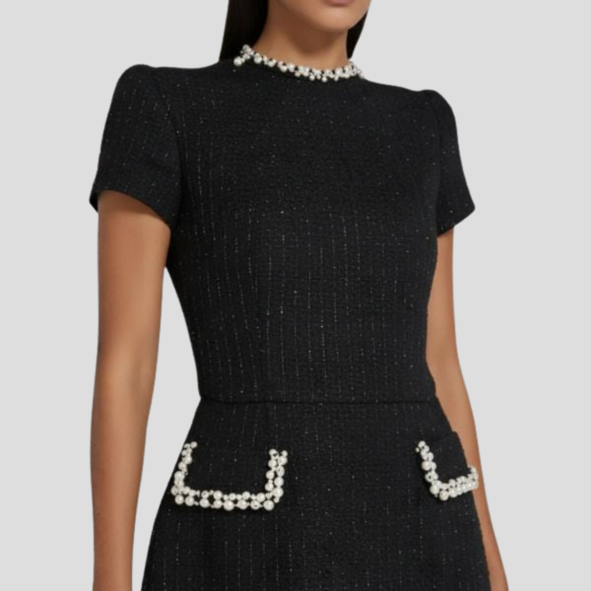 Structured mock neck mini dress with pearl-trim detailing in black and white