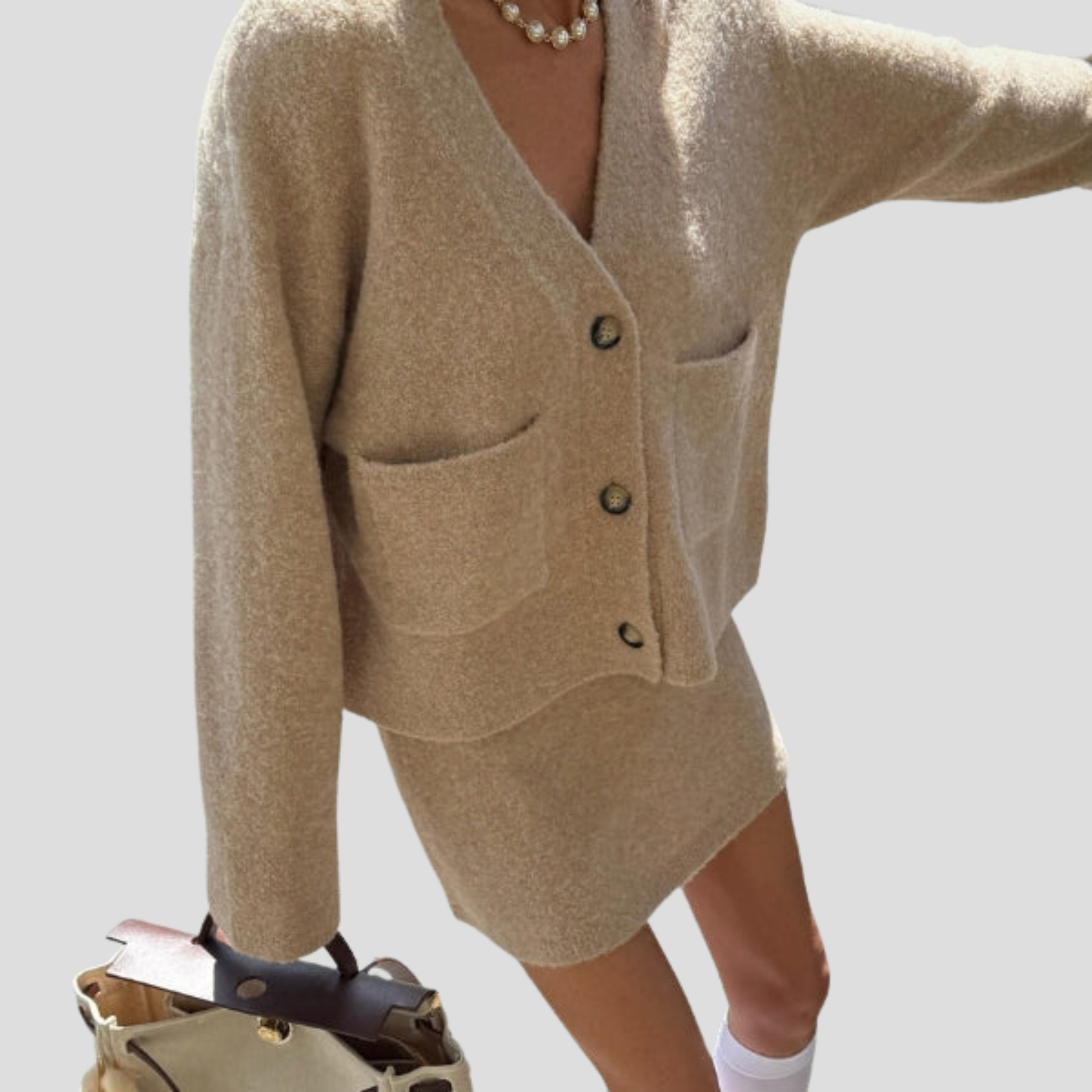 Beige women's two-piece set with V-neck cardigan and coordinated mini skirt