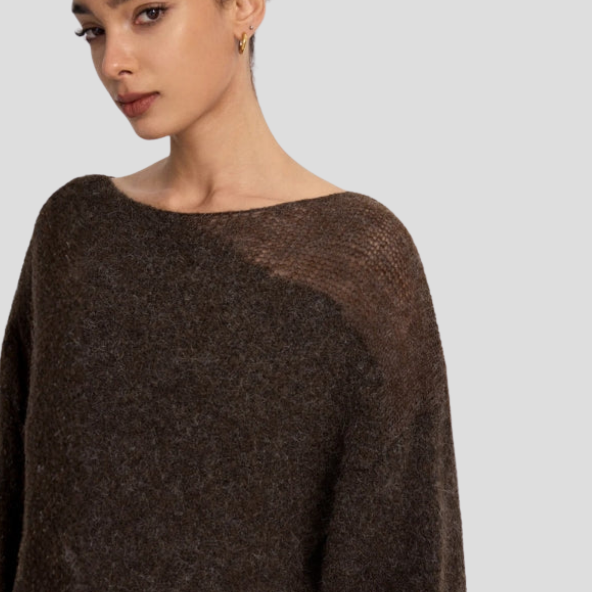 Brown women's boat neck sweater with relaxed draped silhouette and long sleeves