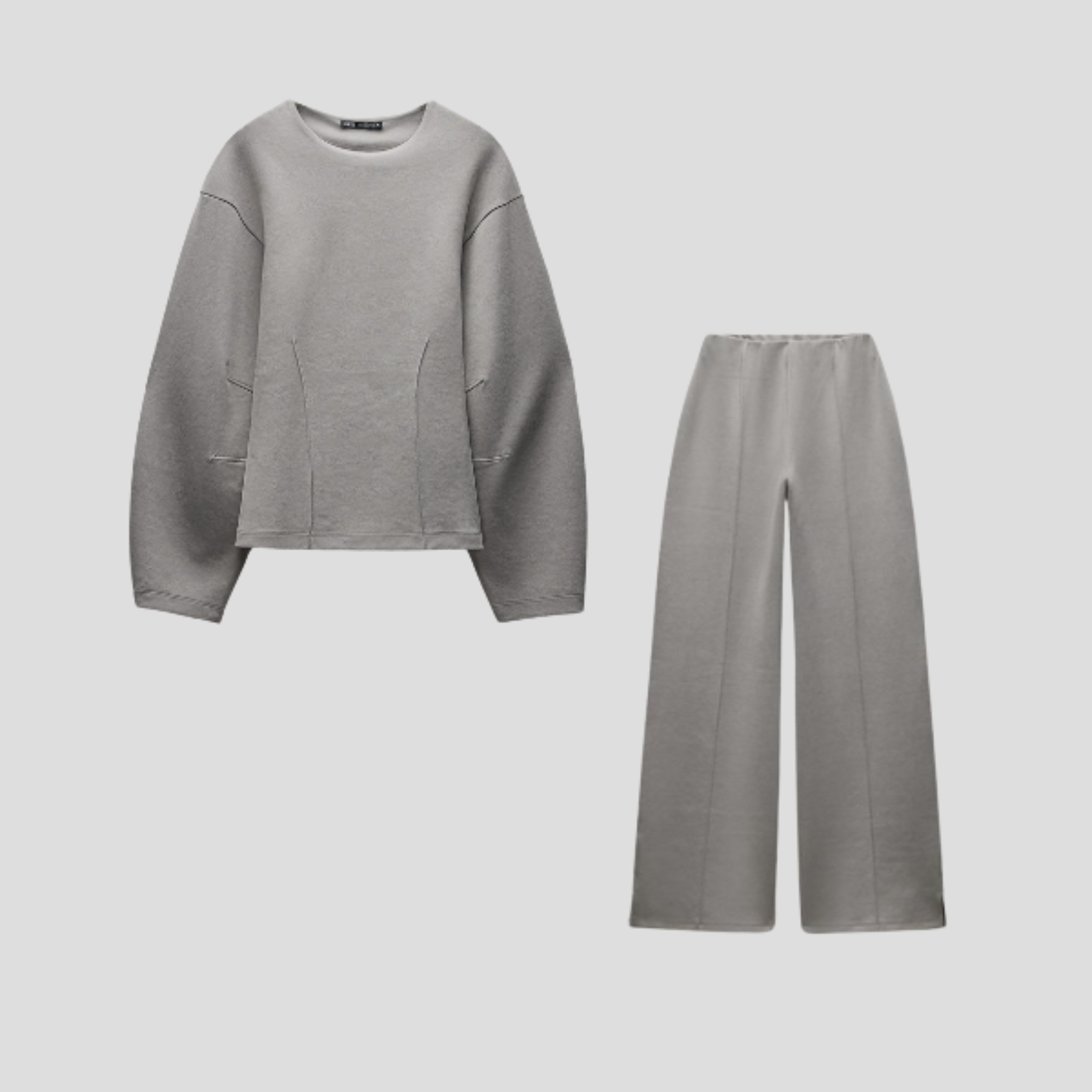 Women's gray coordinated lounge set with relaxed top and matching bottom