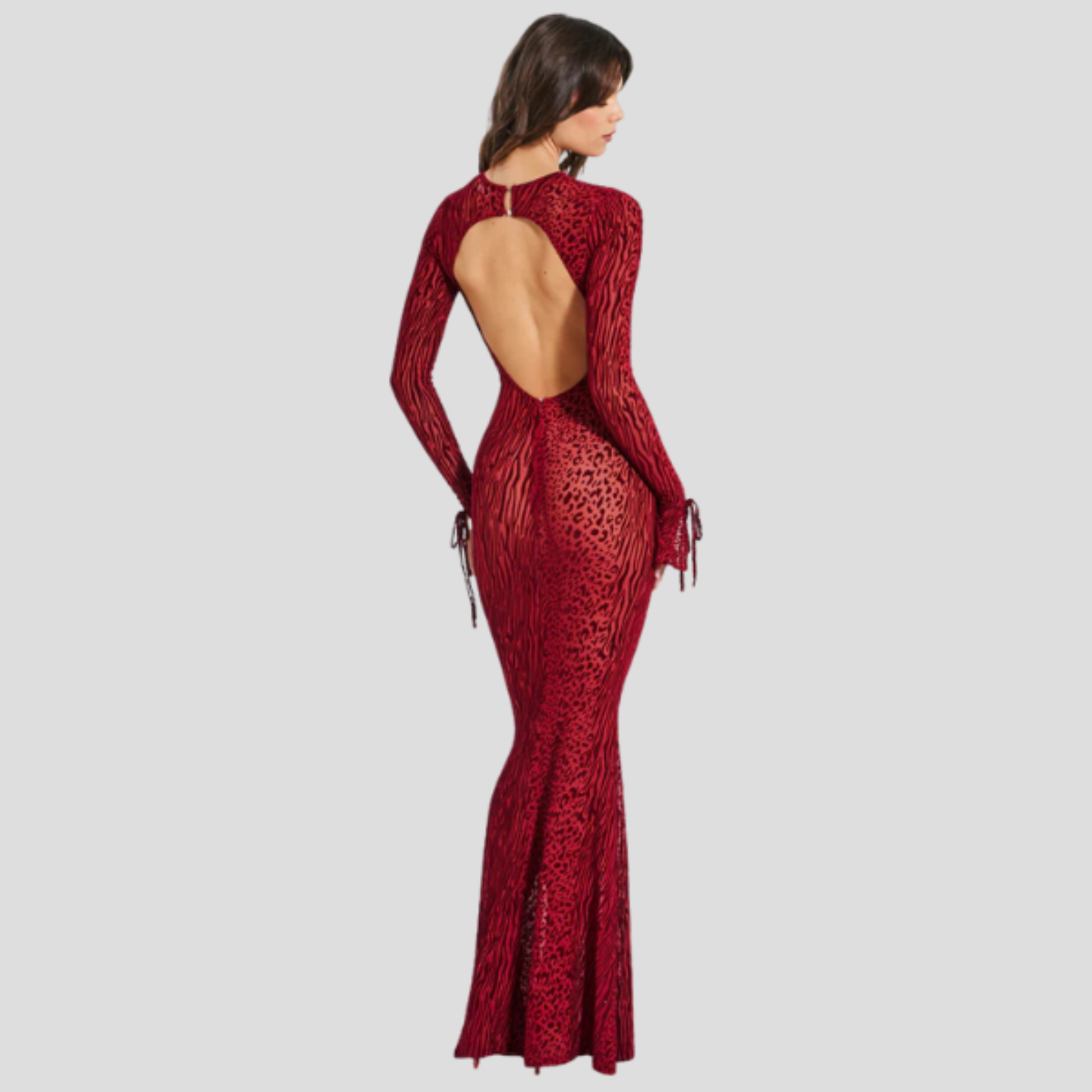 Red long sleeve maxi dress with flared cuff detail and flowing silhouette