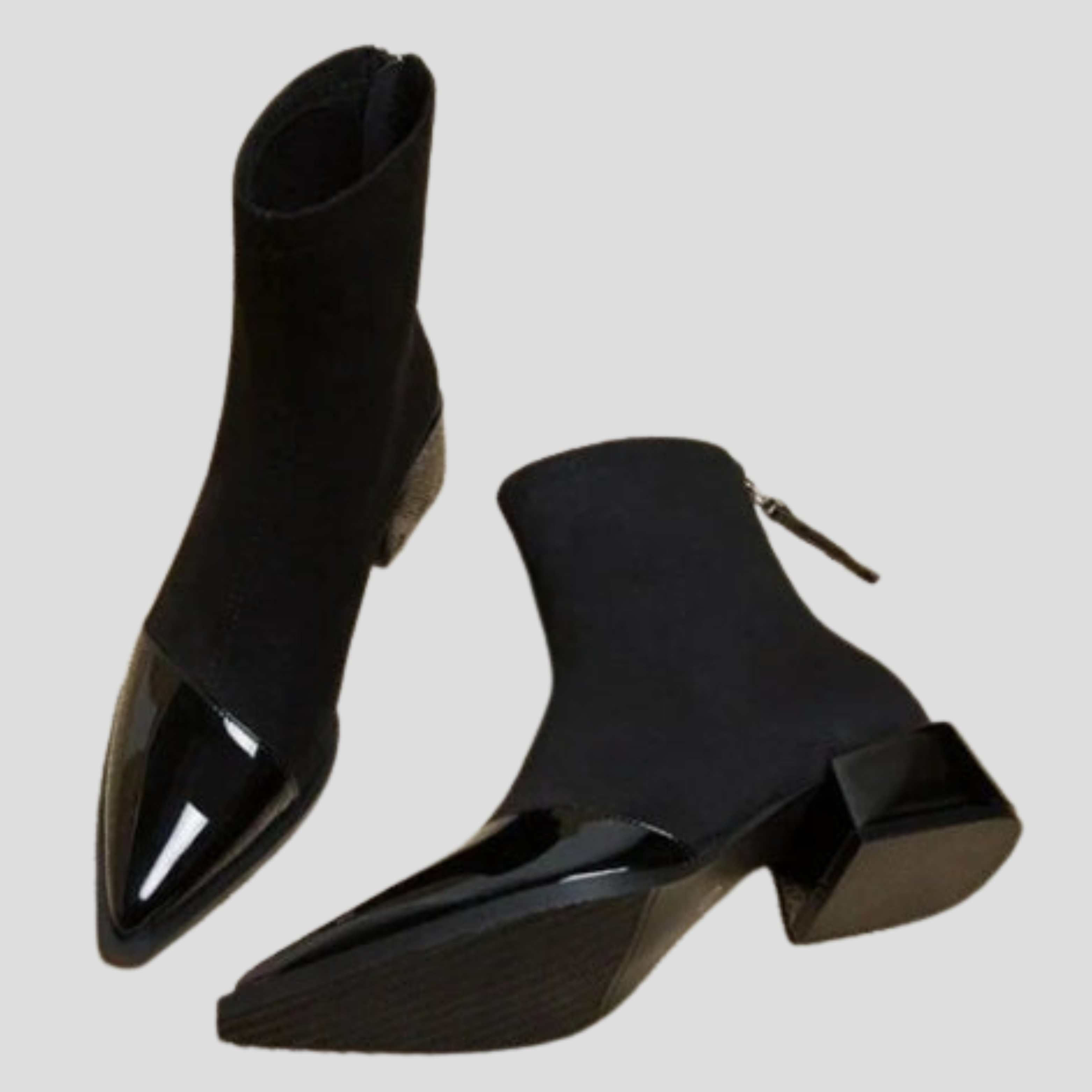 Women's ankle-height boots with contrast detail, shown in black and brown