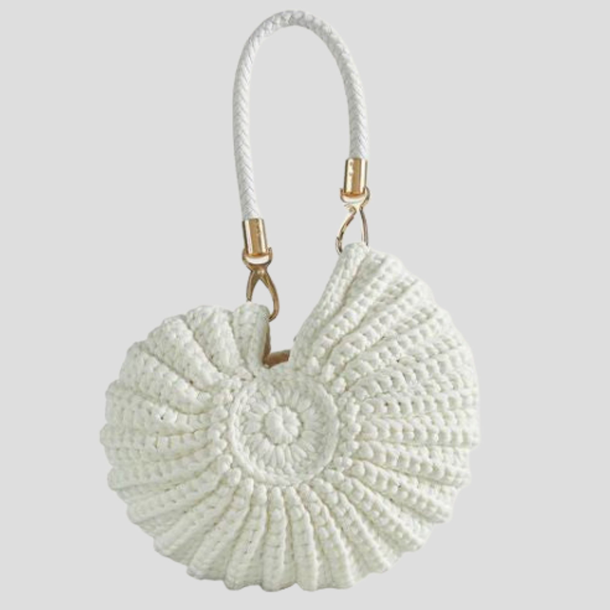 Conch-shaped woven handbag with sculptural silhouette, shown in blue, black, and white