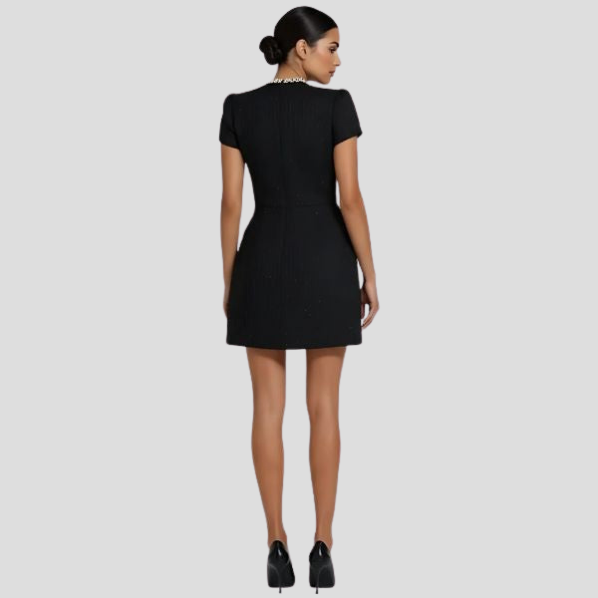 Structured mock neck mini dress with pearl-trim detailing in black and white