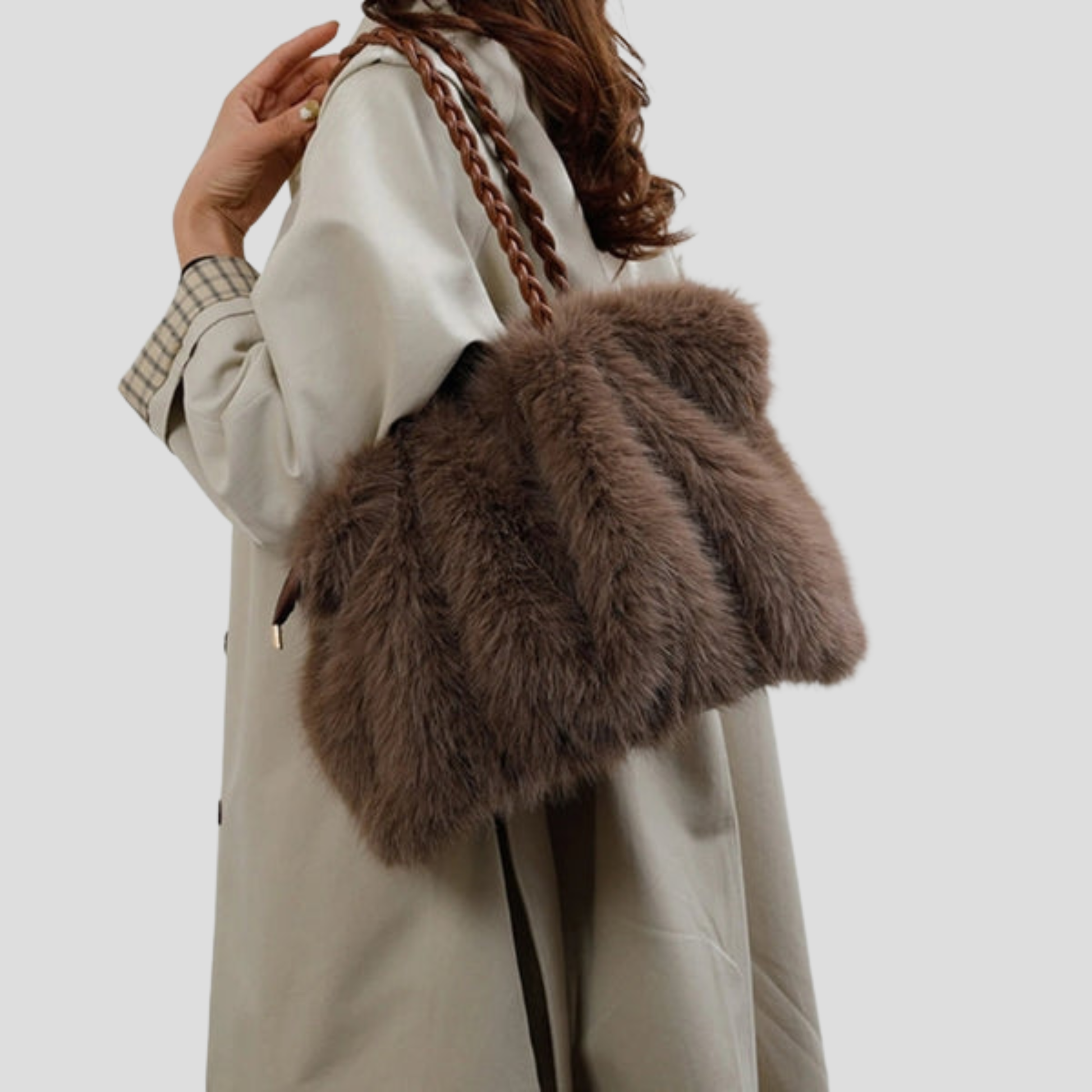 Oversized tote bag with braided handle detail, shown in black, brown, and beige