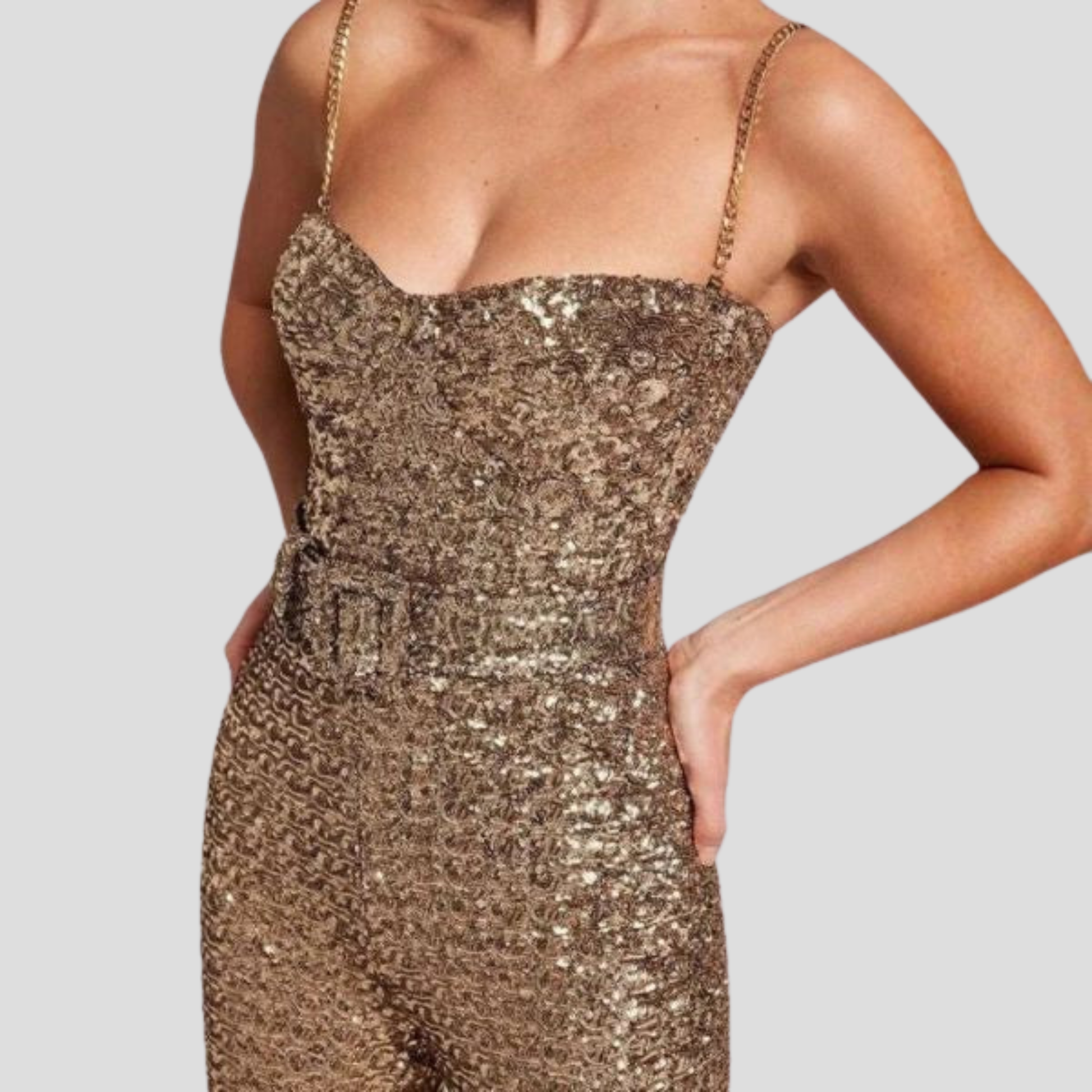 Women's strapless gold jumpsuit with a belted waist